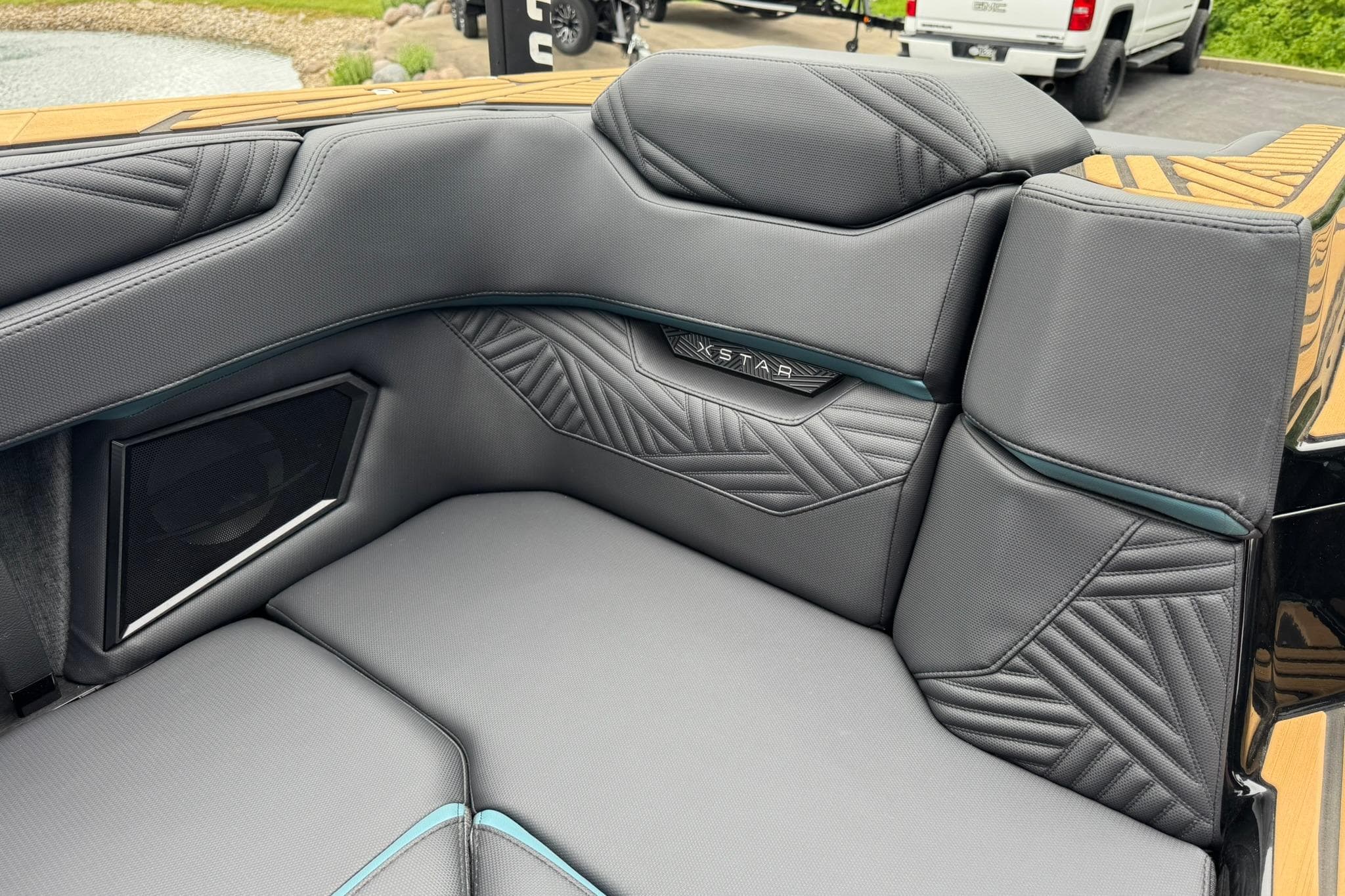 Luxurious interior of 2025 MasterCraft XStar 25 boat with stylish seating design.