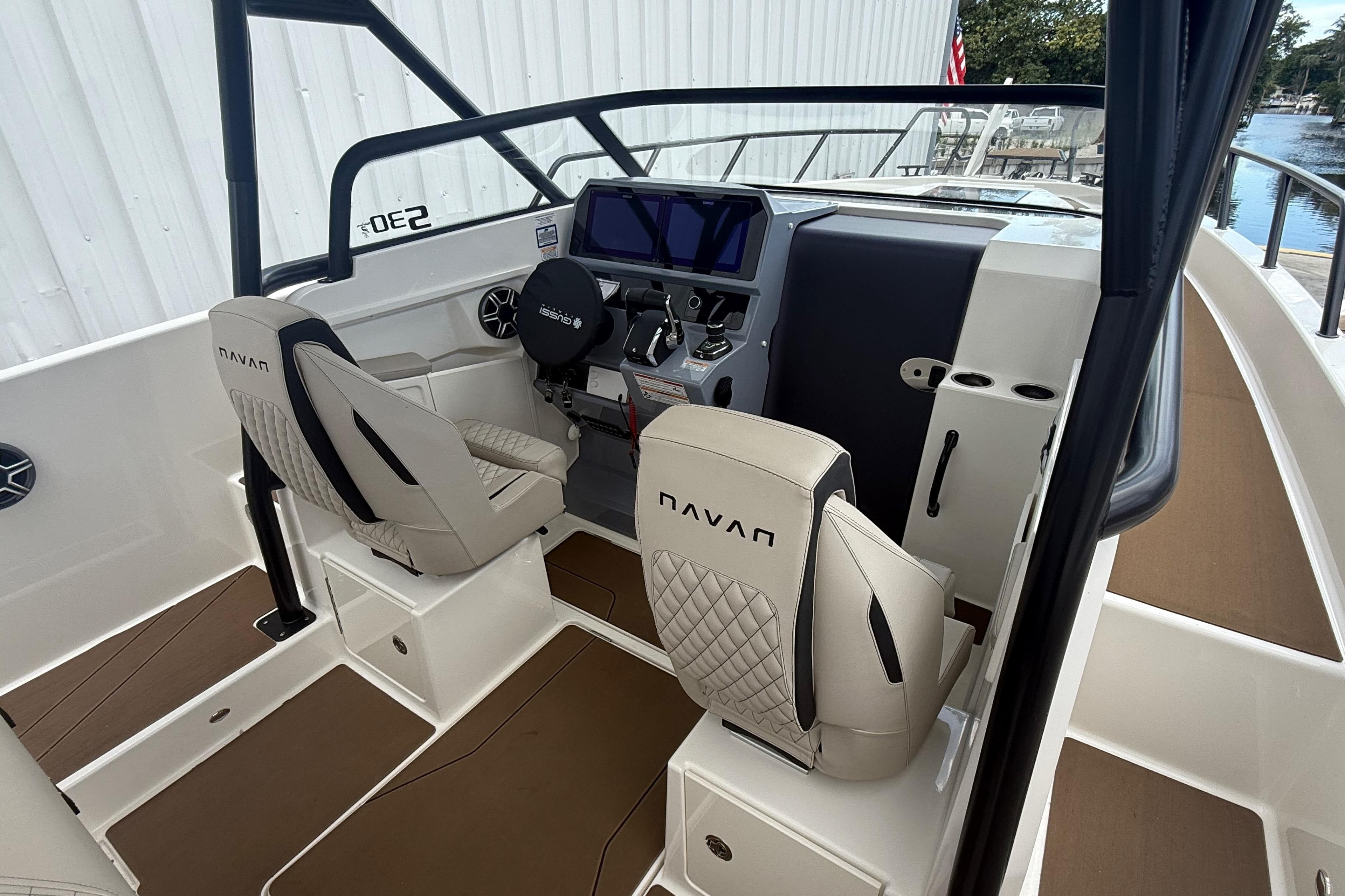 2026 Navan S30 boat interior with modern dashboard and comfortable seating.