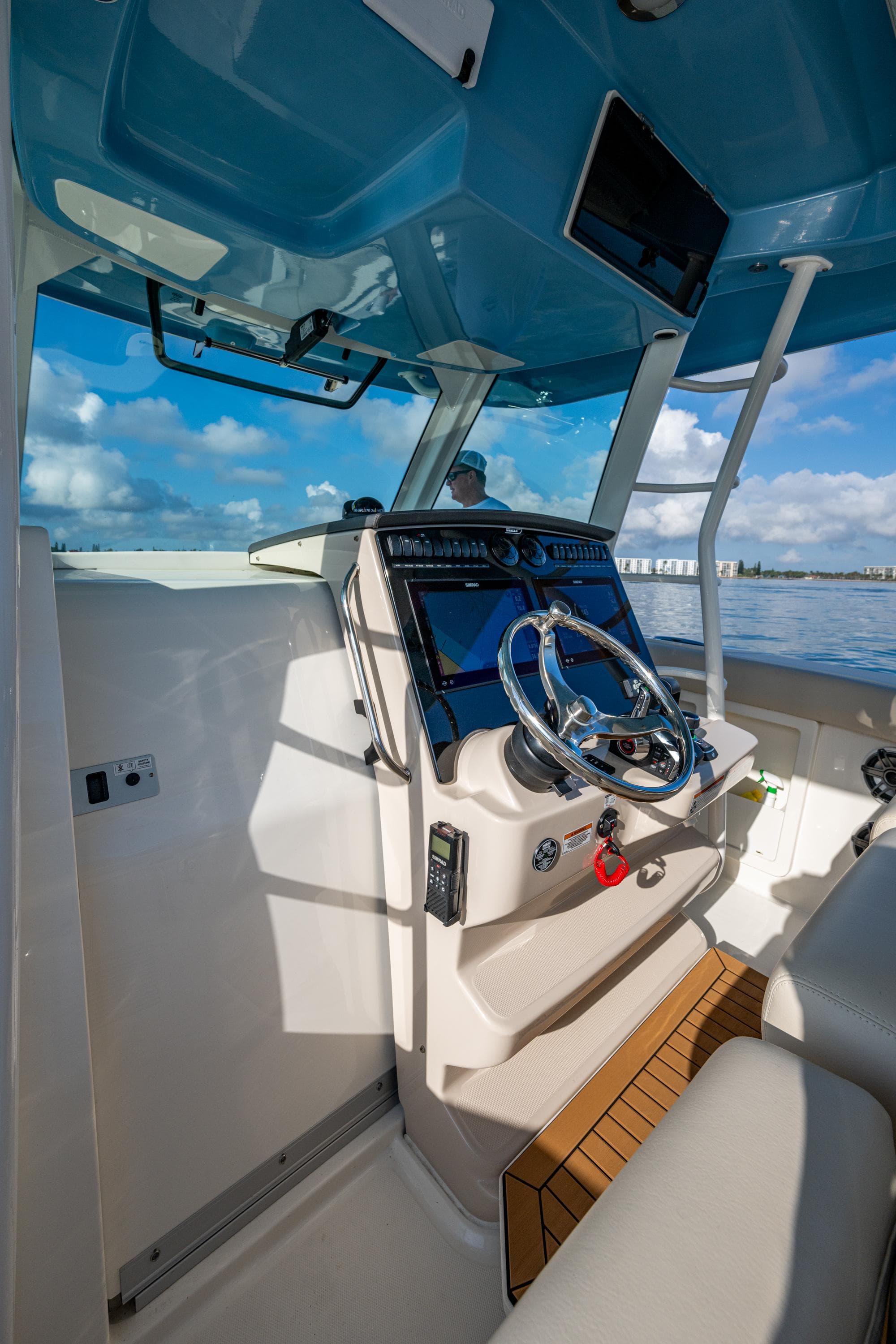 2024 Boston Whaler 380 Outrage helm with modern controls and ocean view.