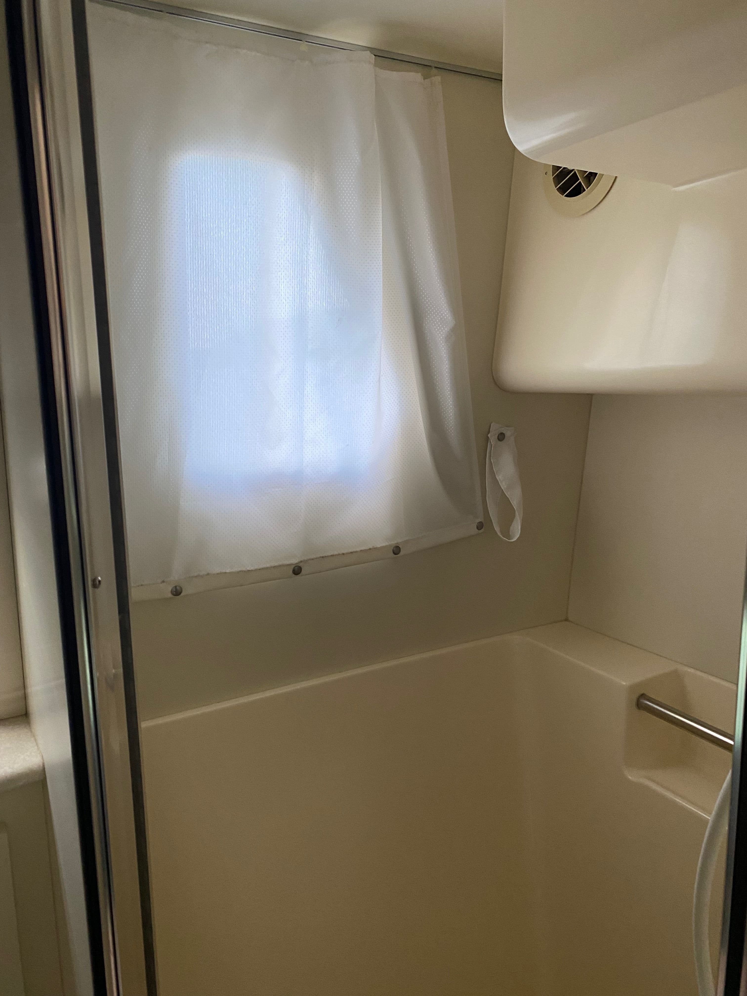 Interior of a 2002 Silverton 330 yacht with shower area.