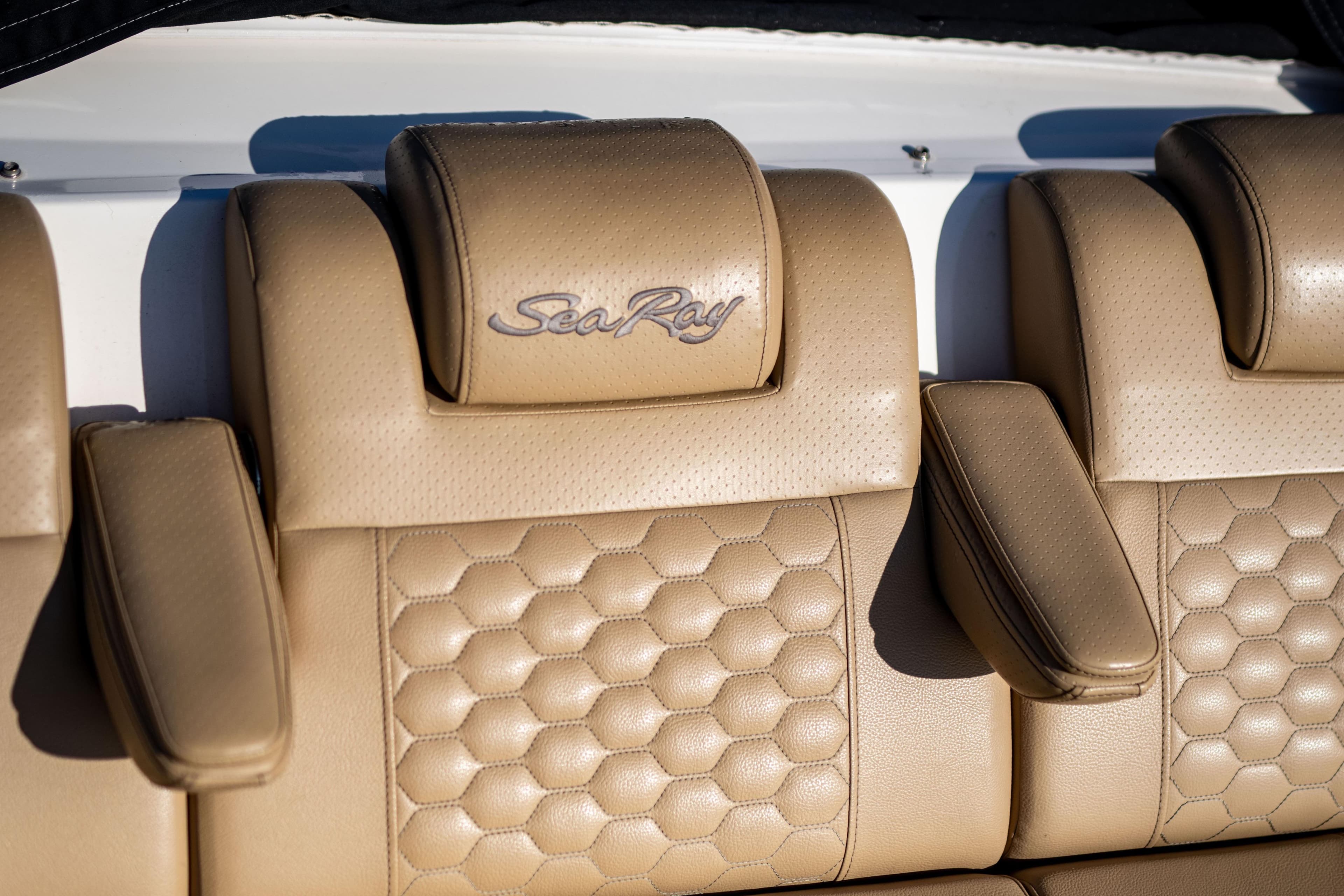 Luxurious tan leather seating on 2022 Sea Ray Sundancer 320 boat.