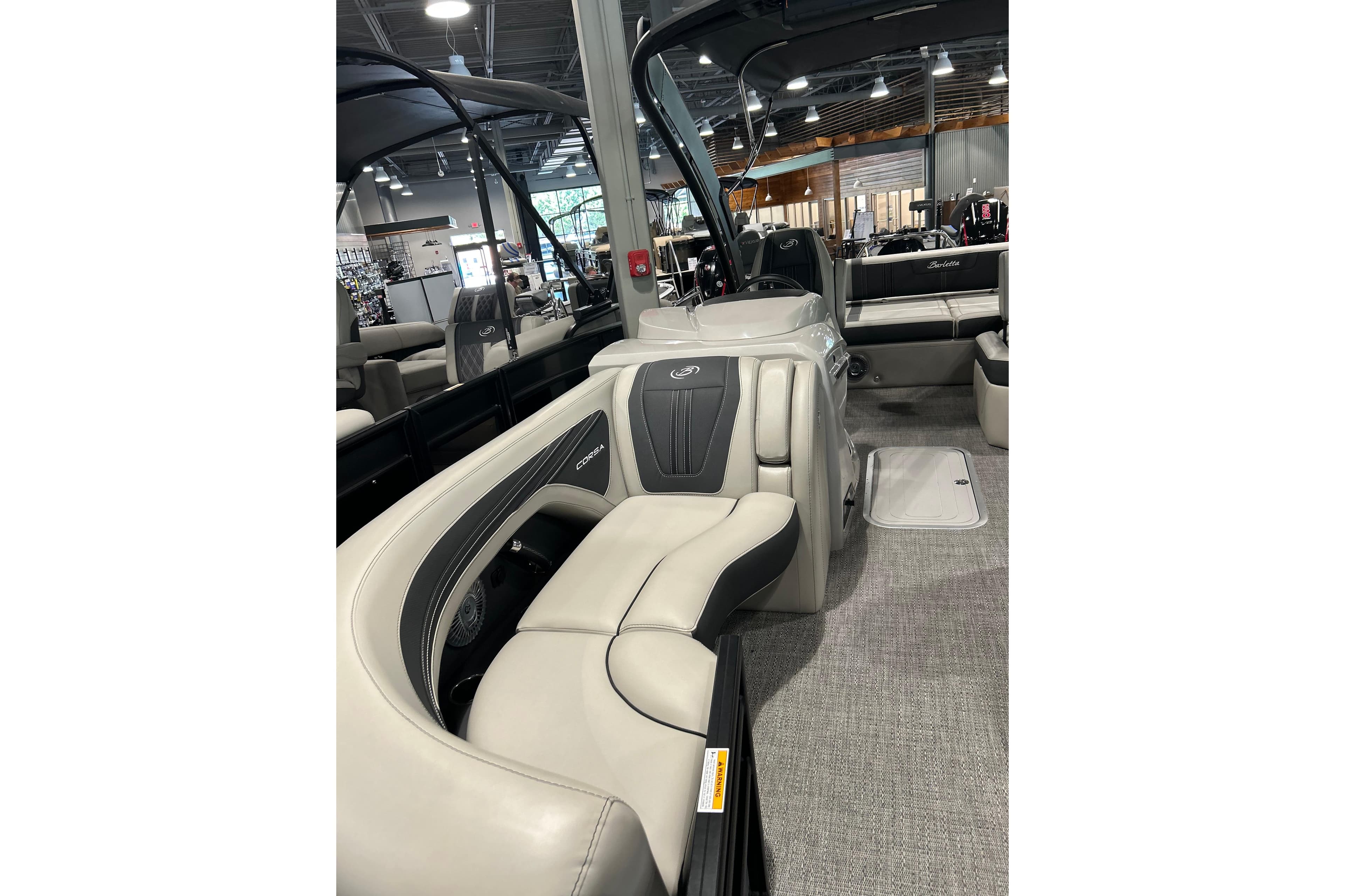 Interior of 2026 Barletta Corsa 23UA with luxurious seating.