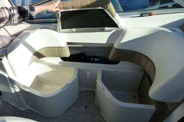 2004 Four Winns 298 Vista boat interior with open storage compartments.