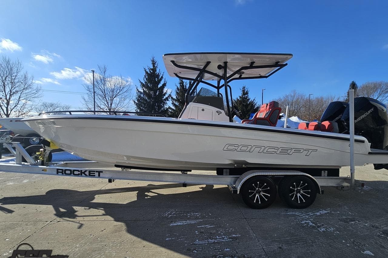 2025 Concept 27' CC boat on trailer under clear blue sky.