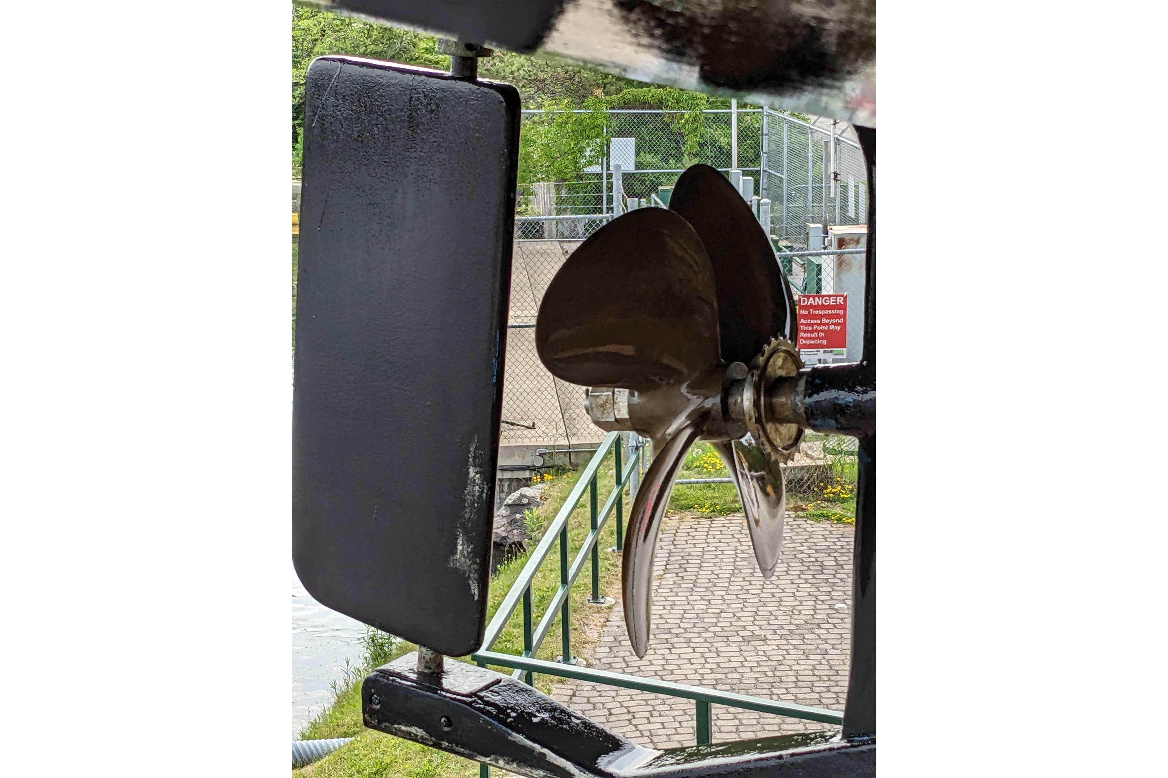 Propeller and rudder of 2005 American Tug 41, dockside view.