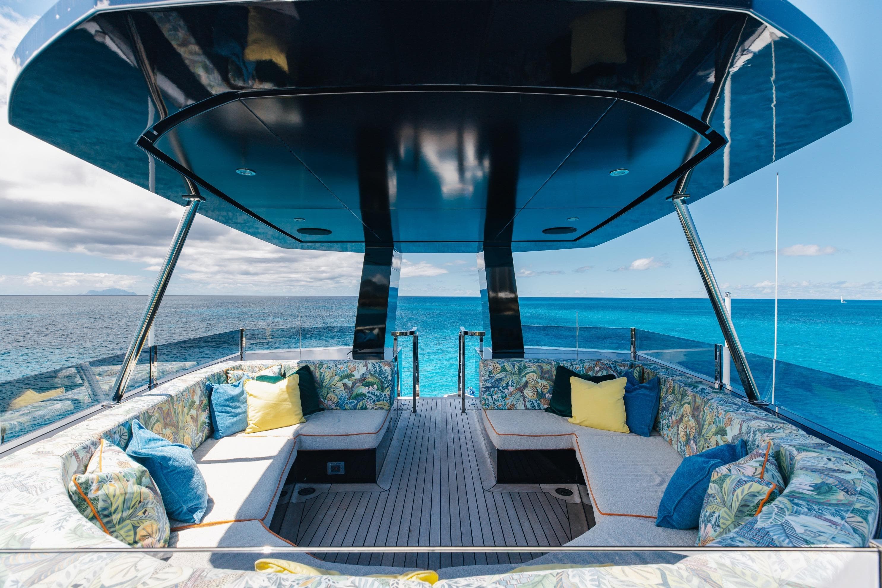 Luxurious 2024 Dunya Yachts Explorer with elegant seating, overlooking serene ocean views.