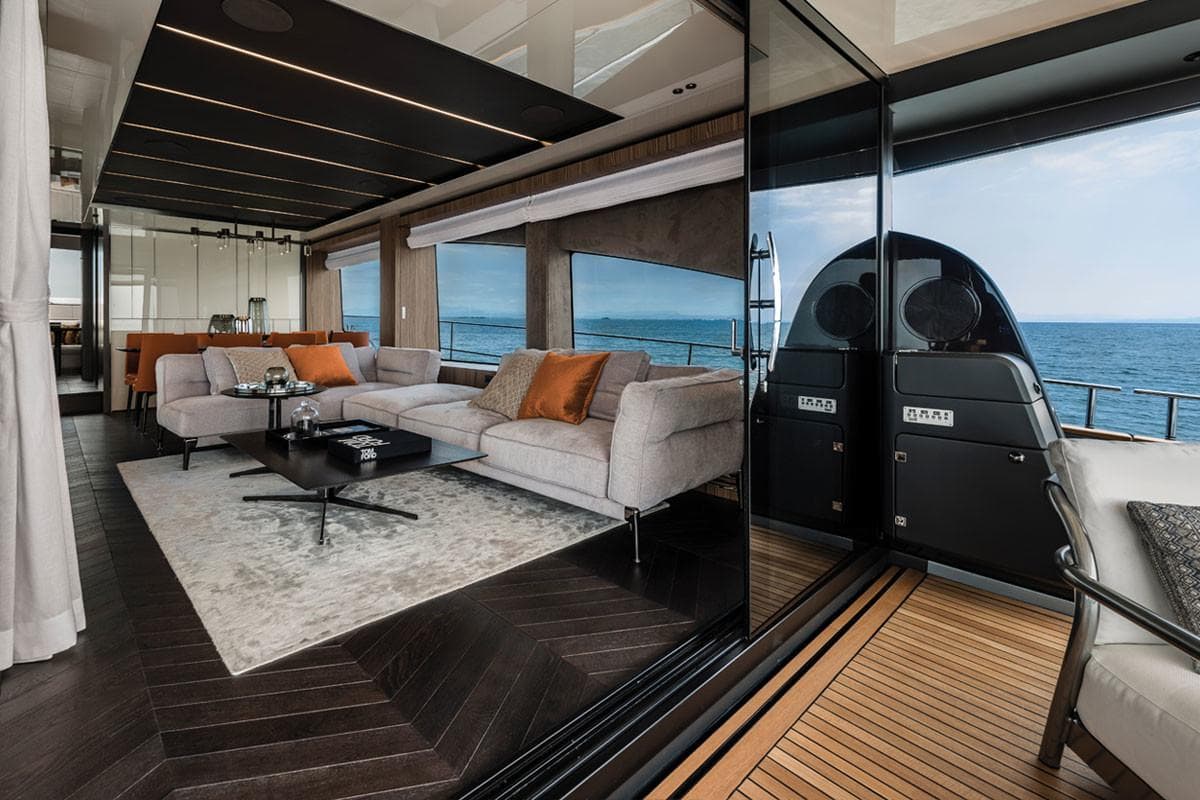 Luxurious interior of 2025 Cranchi Settantotto 78 yacht with ocean view.