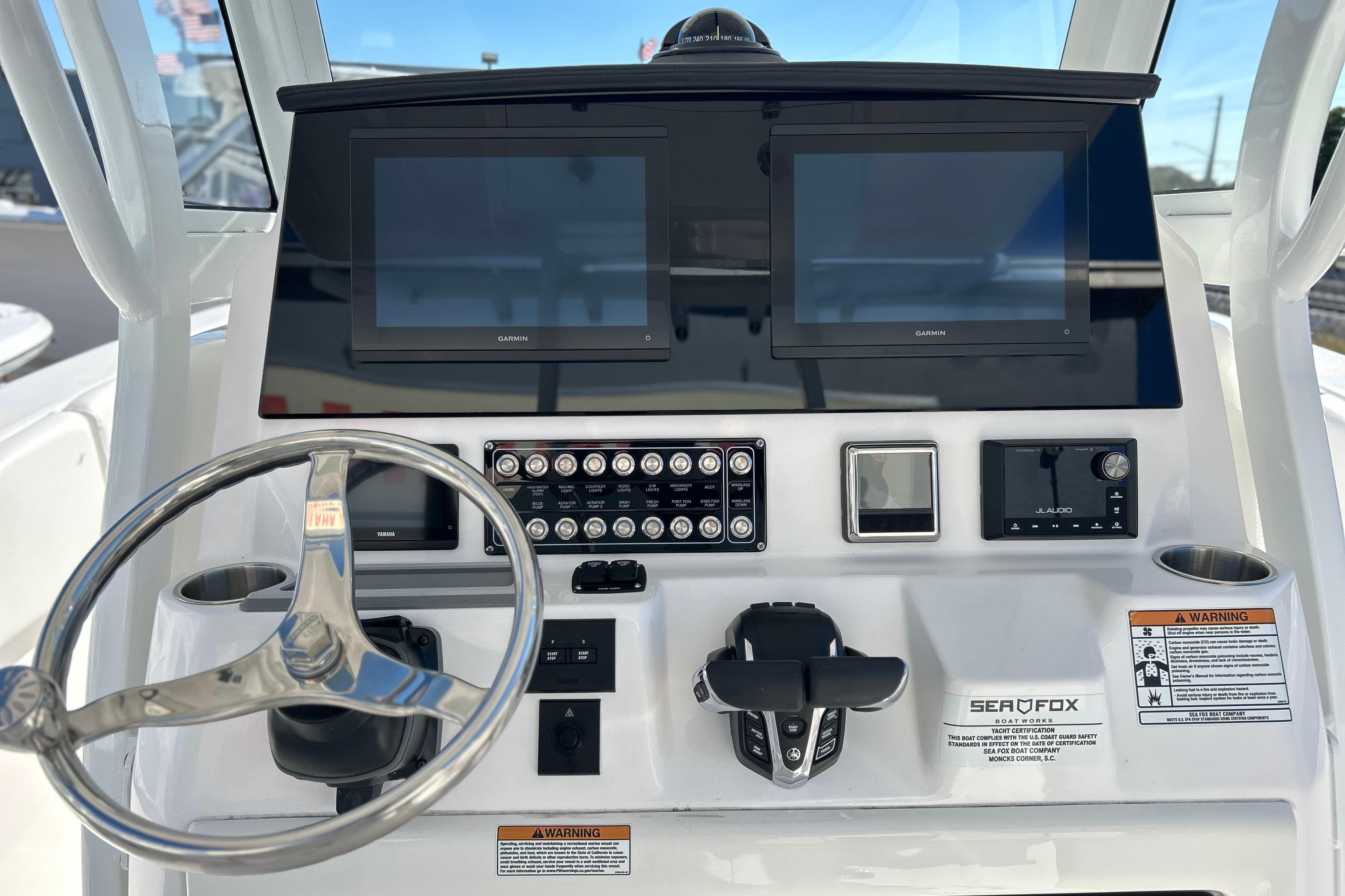 2026 Sea Fox 288 Commander dashboard with dual Garmin displays and steering wheel.