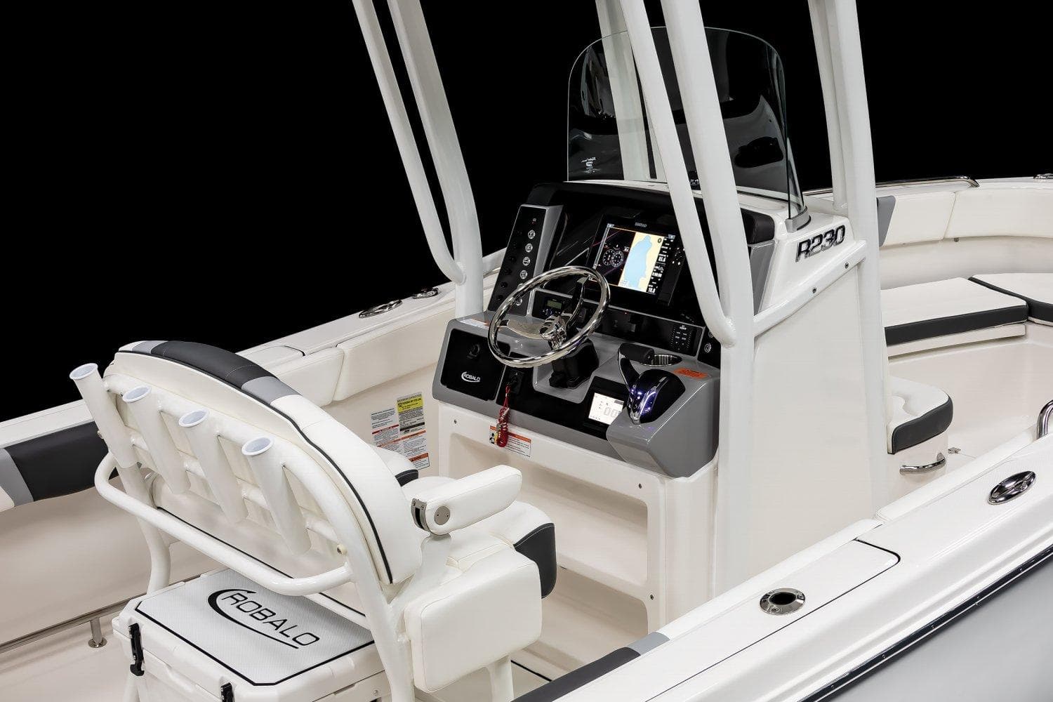 2025 Robalo R230 Center Console boat interior with modern dashboard and seating.