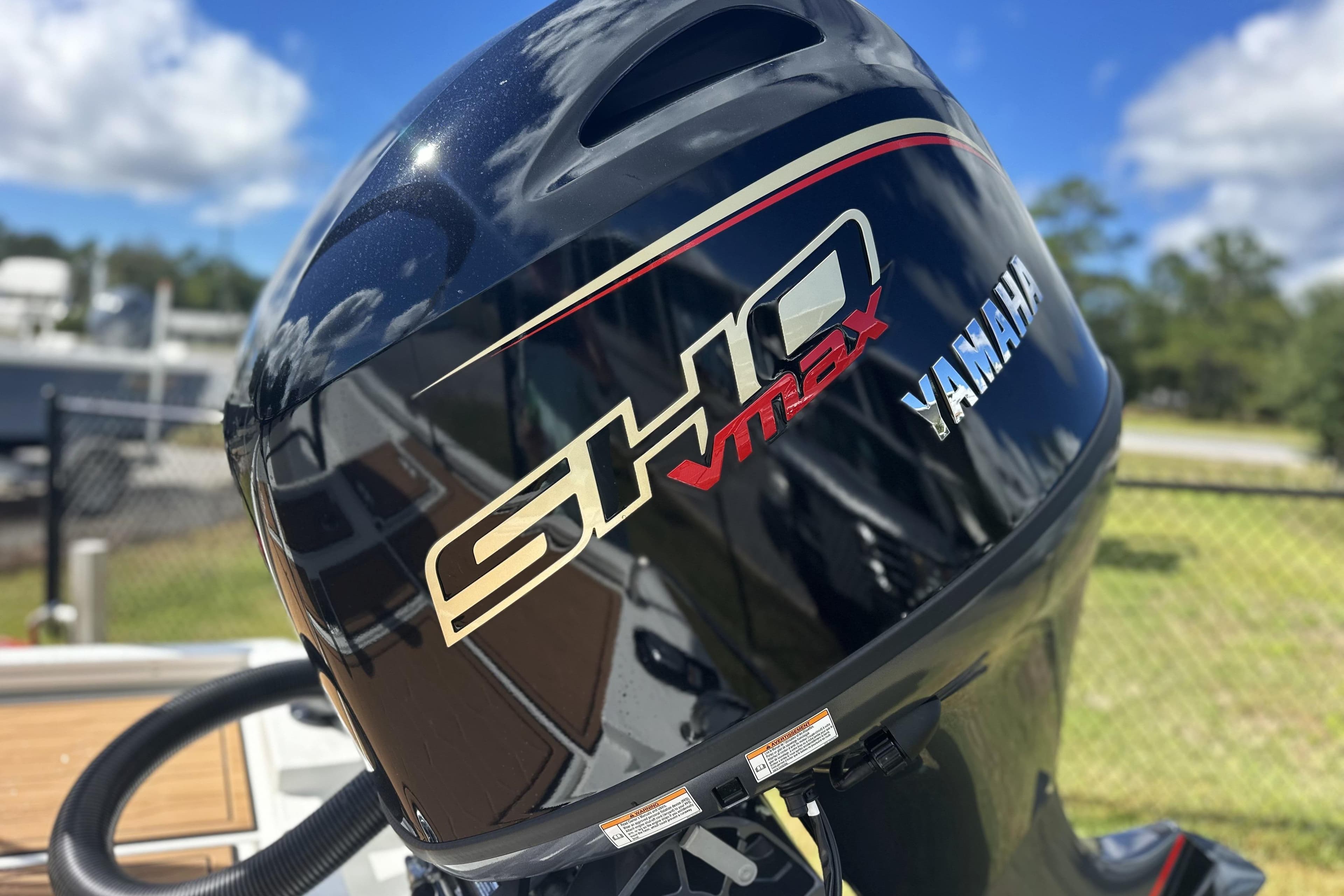 Yamaha SHO VMAX outboard motor on 2026 Avid 19 FSX boat, sunny day background.