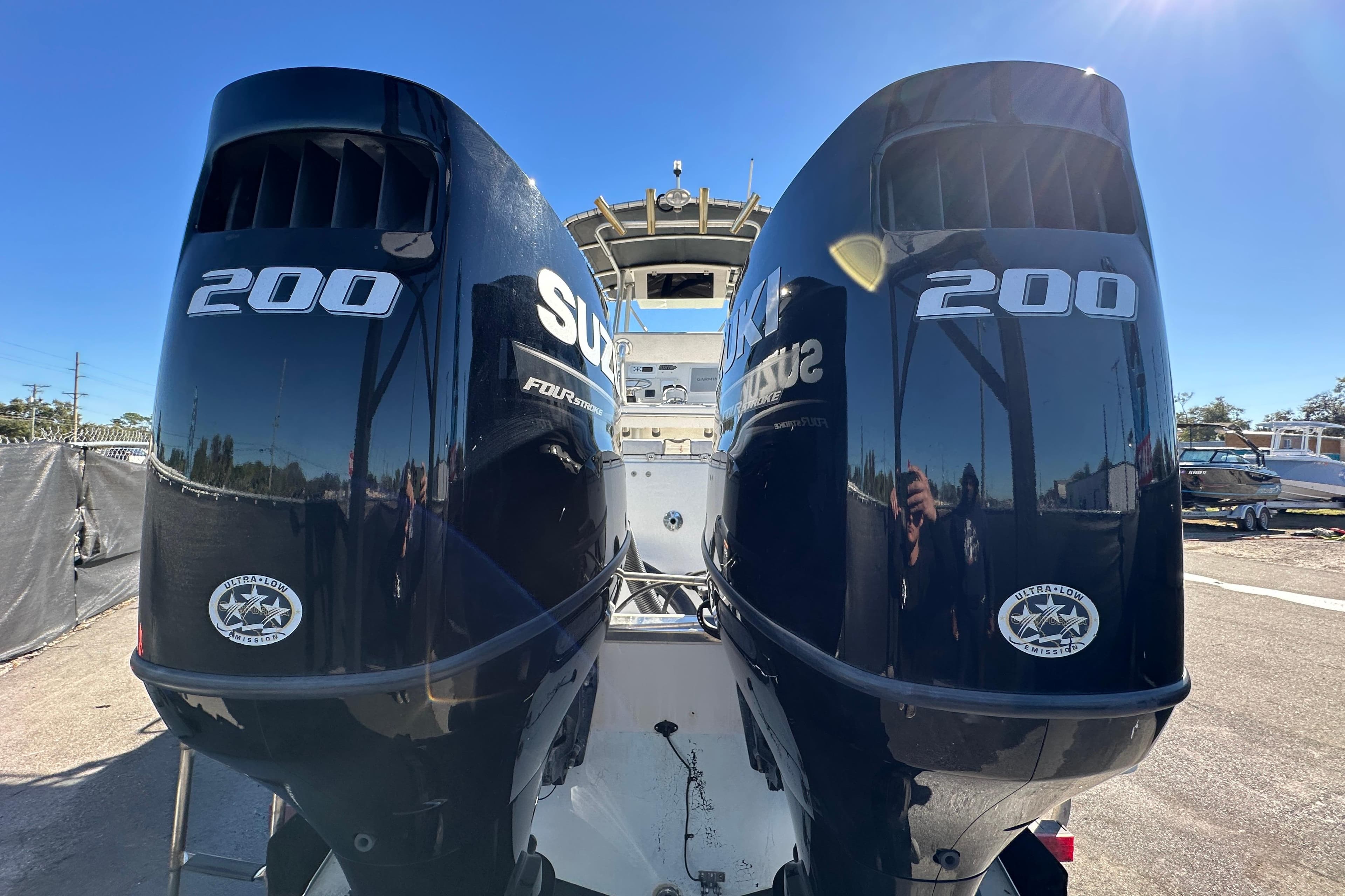 Twin Suzuki 200 outboard engines on a 1999 Robalo 2420 Center Console boat.