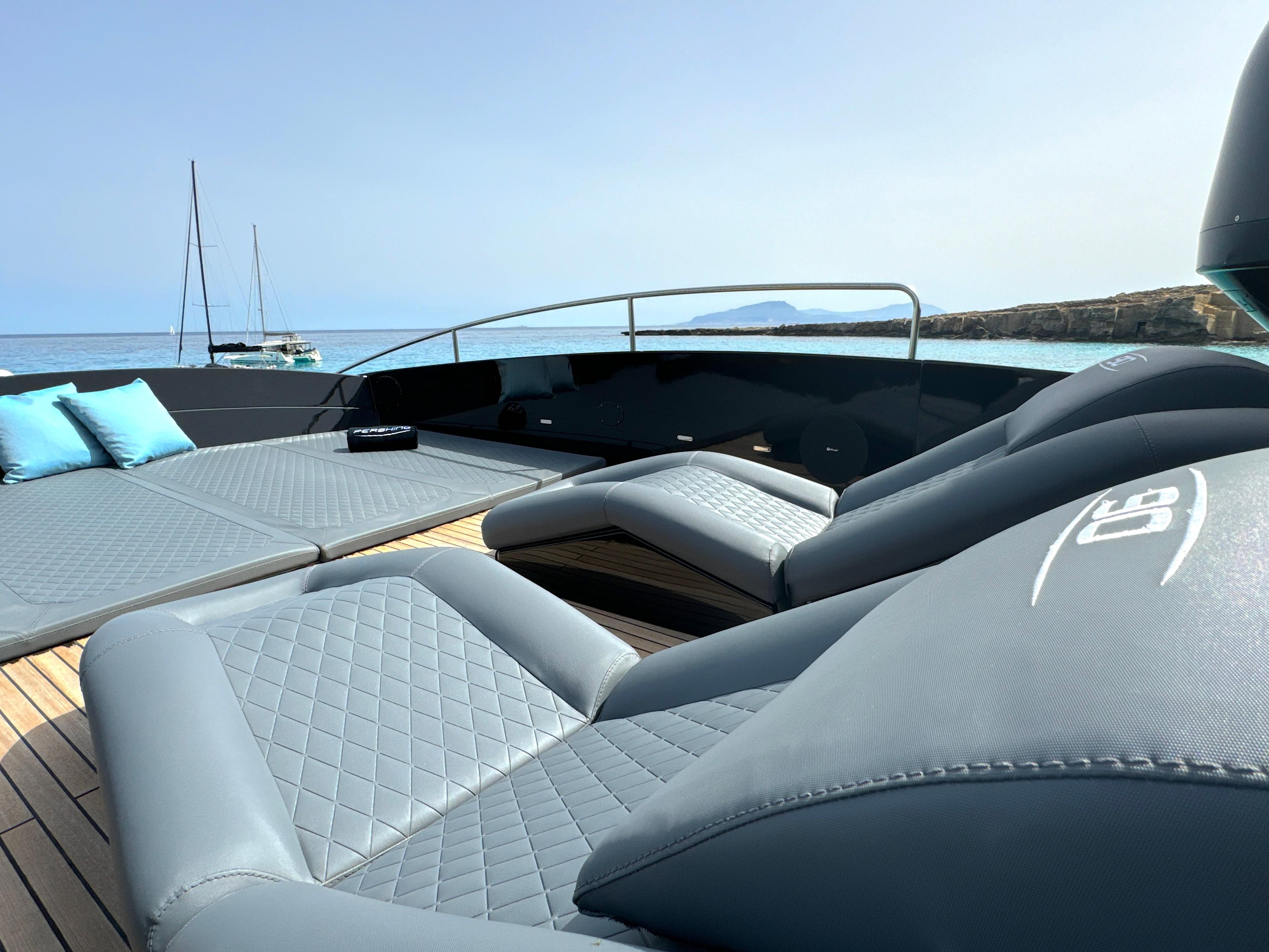Luxurious 2008 Pershing 90 yacht deck with elegant seating and ocean view.
