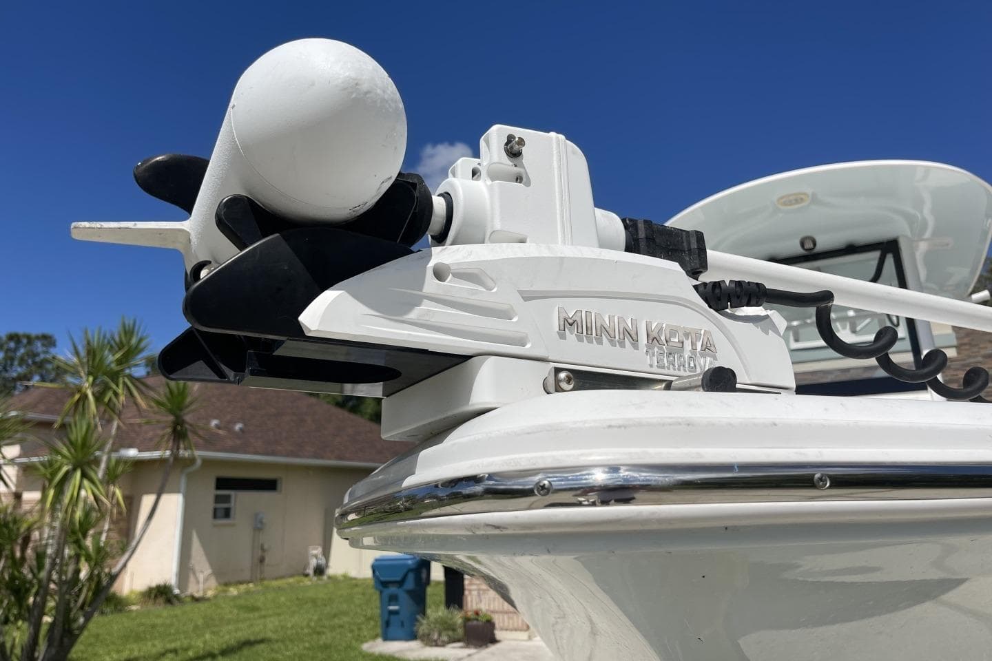 2020 Sea Hunt BX 25 FS boat with Minn Kota Terrova trolling motor, sunny day background.