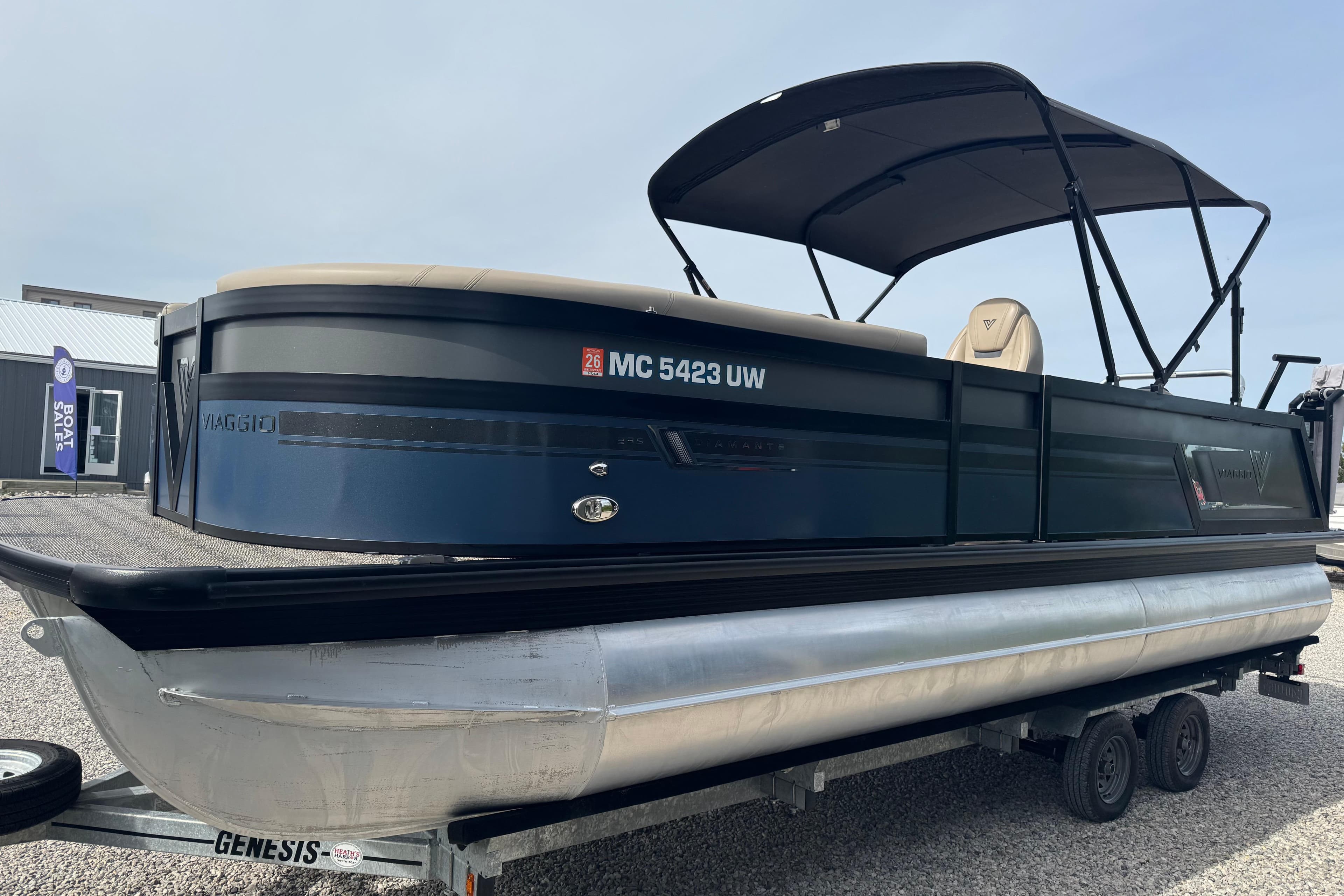 2023 Viaggio DIAMANTE 23S pontoon boat on trailer, side view with canopy.