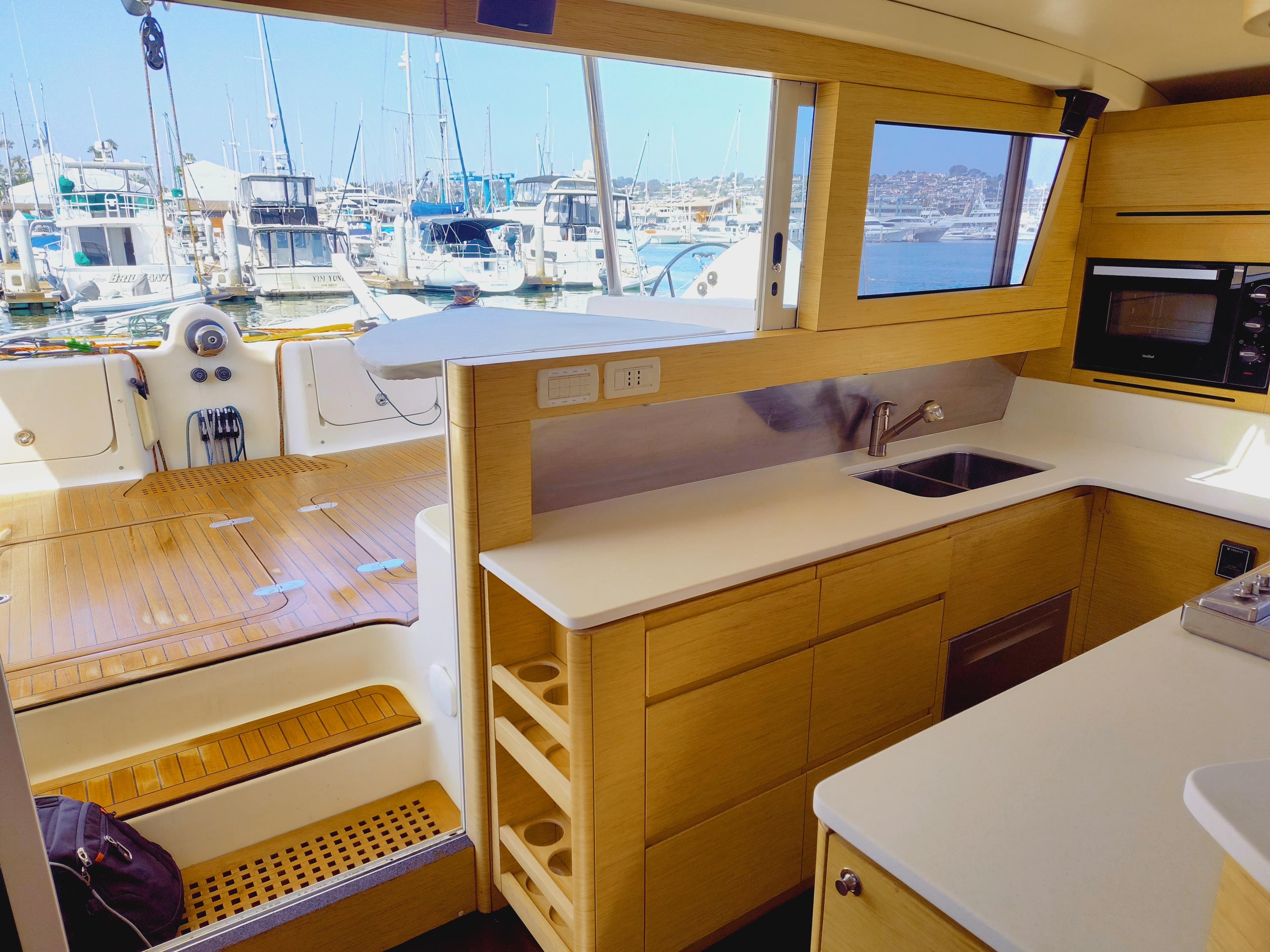 Interior of a 2011 Performance Catamarans 52 with modern kitchen.