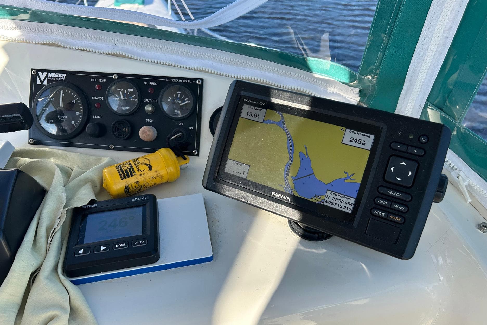 Navigation equipment on a 2002 Custom 64 Stuart Catamarans, featuring Garmin GPS and control panel.