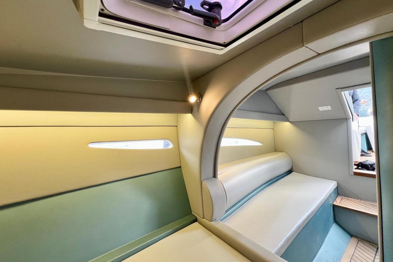 Interior of ALBATRO 32 EVO XL Easy boat, featuring modern seating and sleek design.