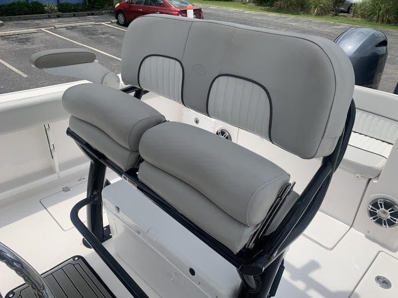 2023 Sea Fox 268 Commander boat seating with cushioned backrests and armrests.
