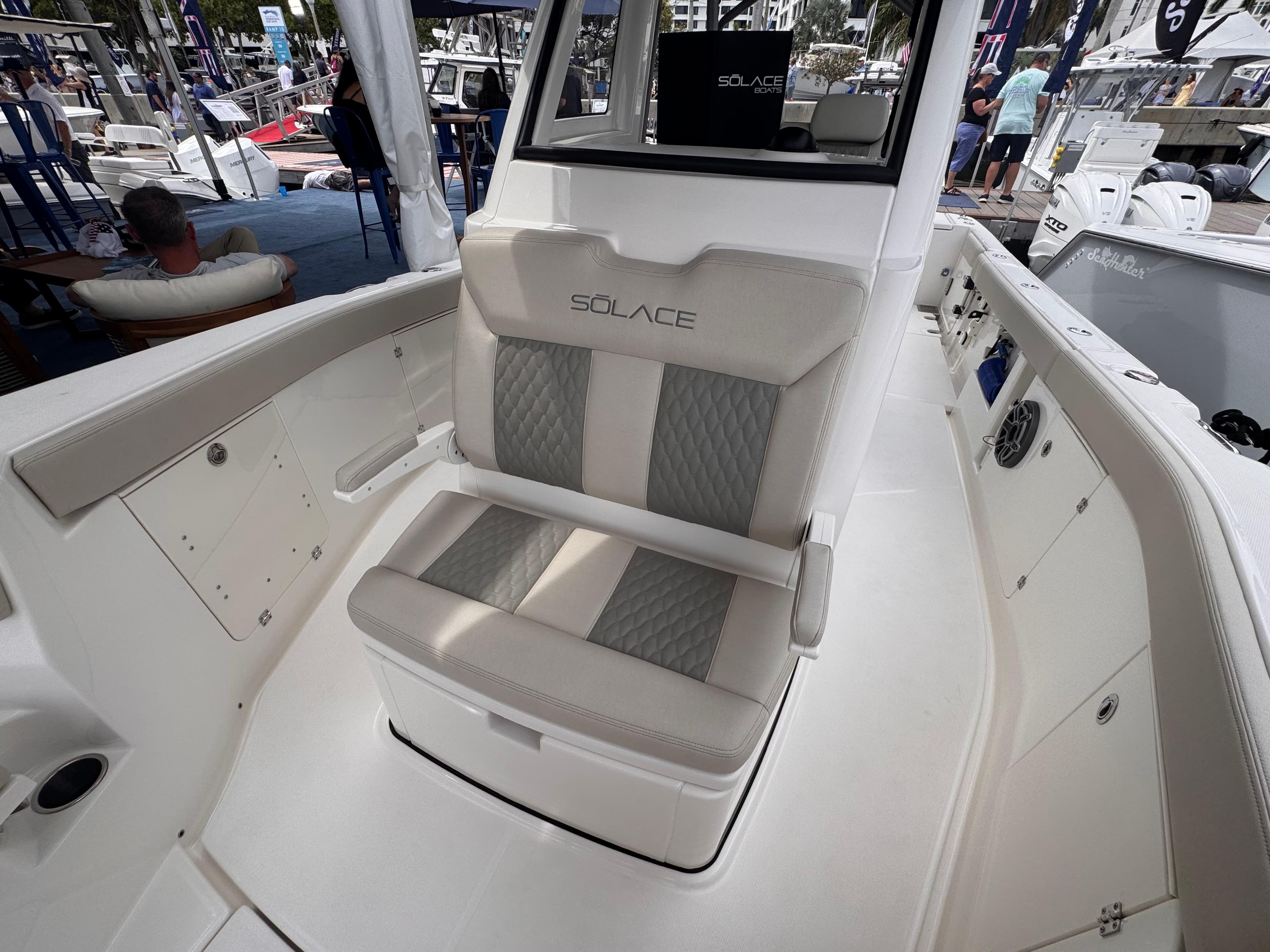 2025 Solace 30 CS boat interior with cushioned seating and modern design.
