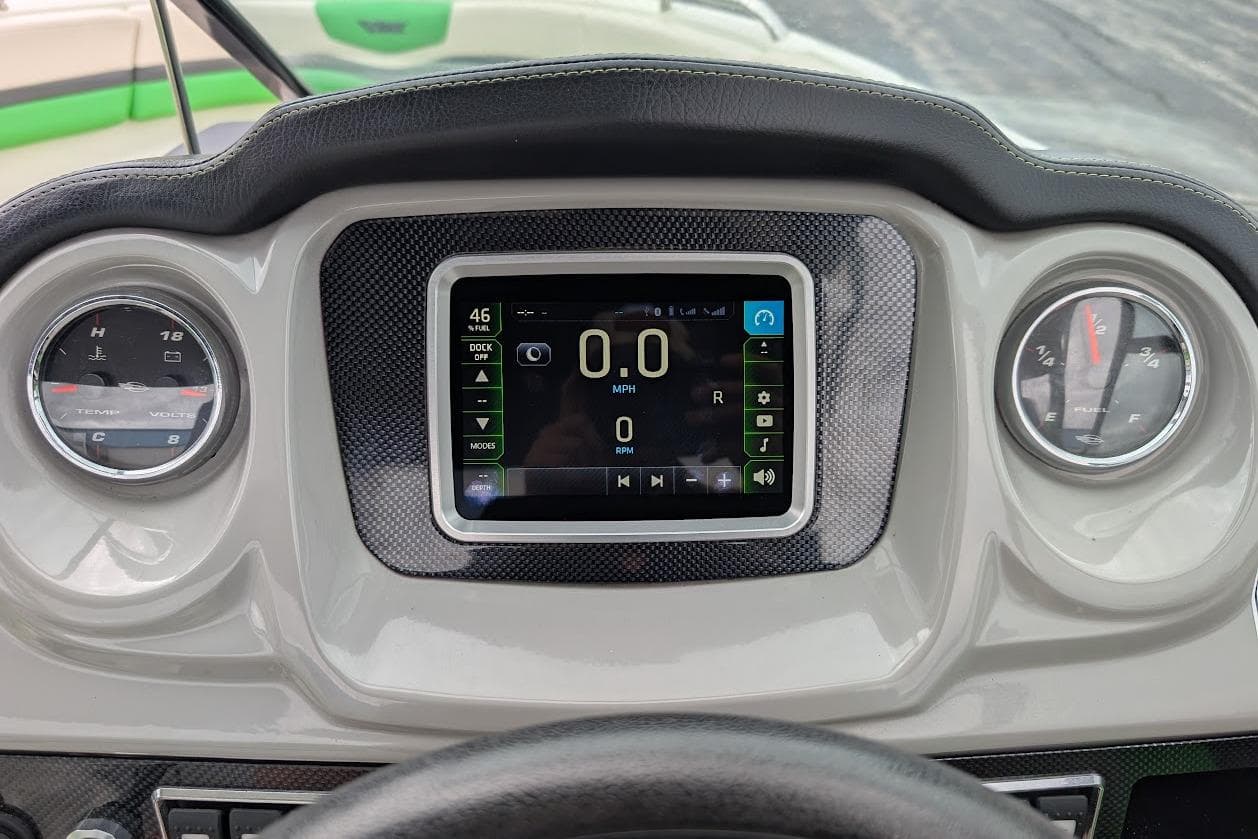 Dashboard of 2018 Chaparral Vortex 203 VRX boat with digital display and gauges.