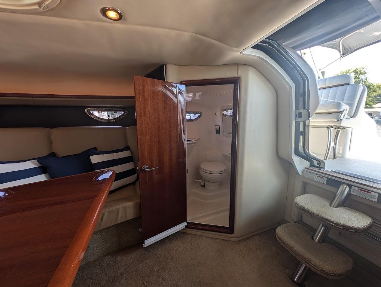 Interior of 2007 Cobalt 323 boat with cabin and bathroom.