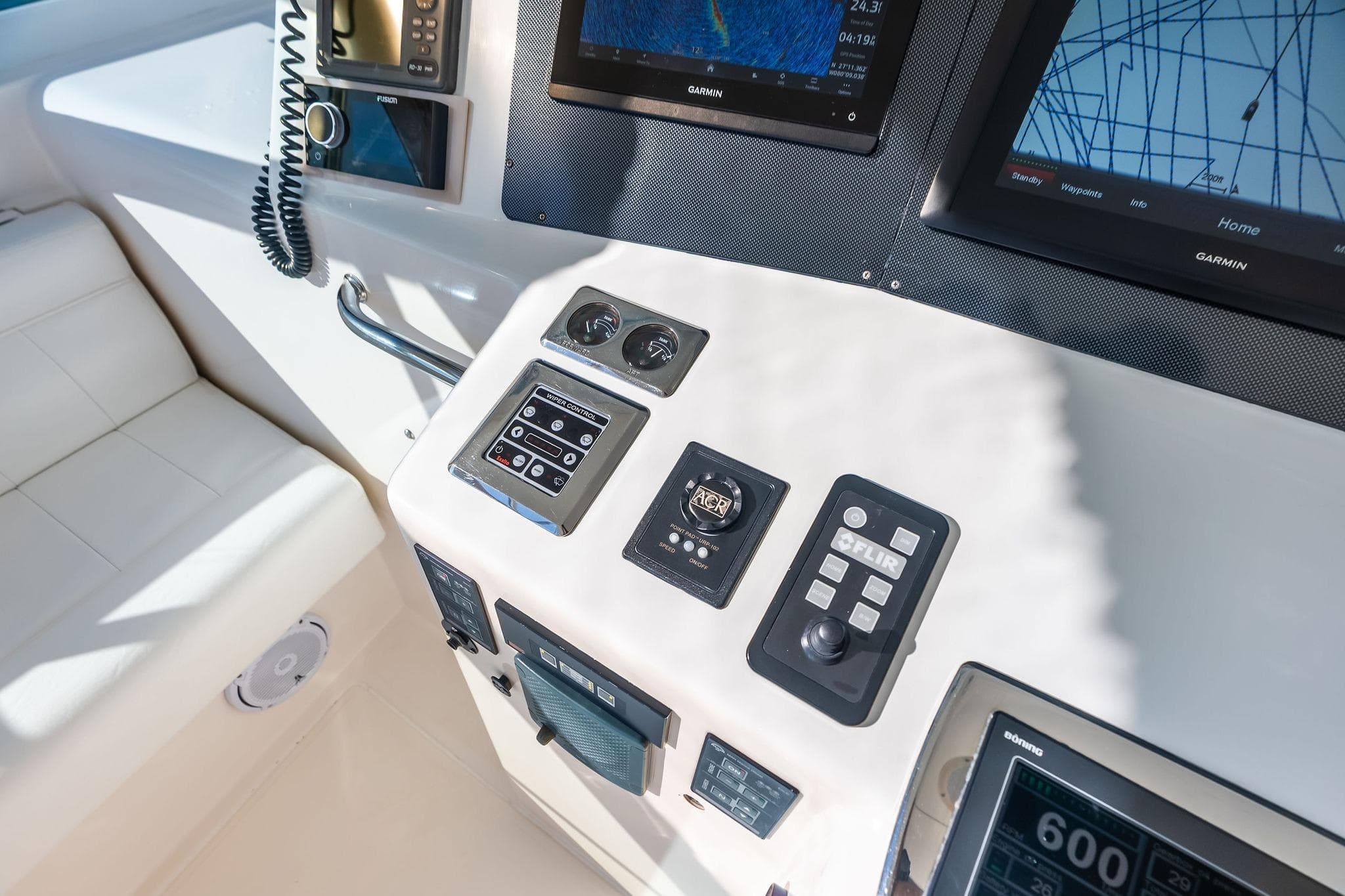Control panel of a 2006 Cabo 45 Express boat with navigation equipment.