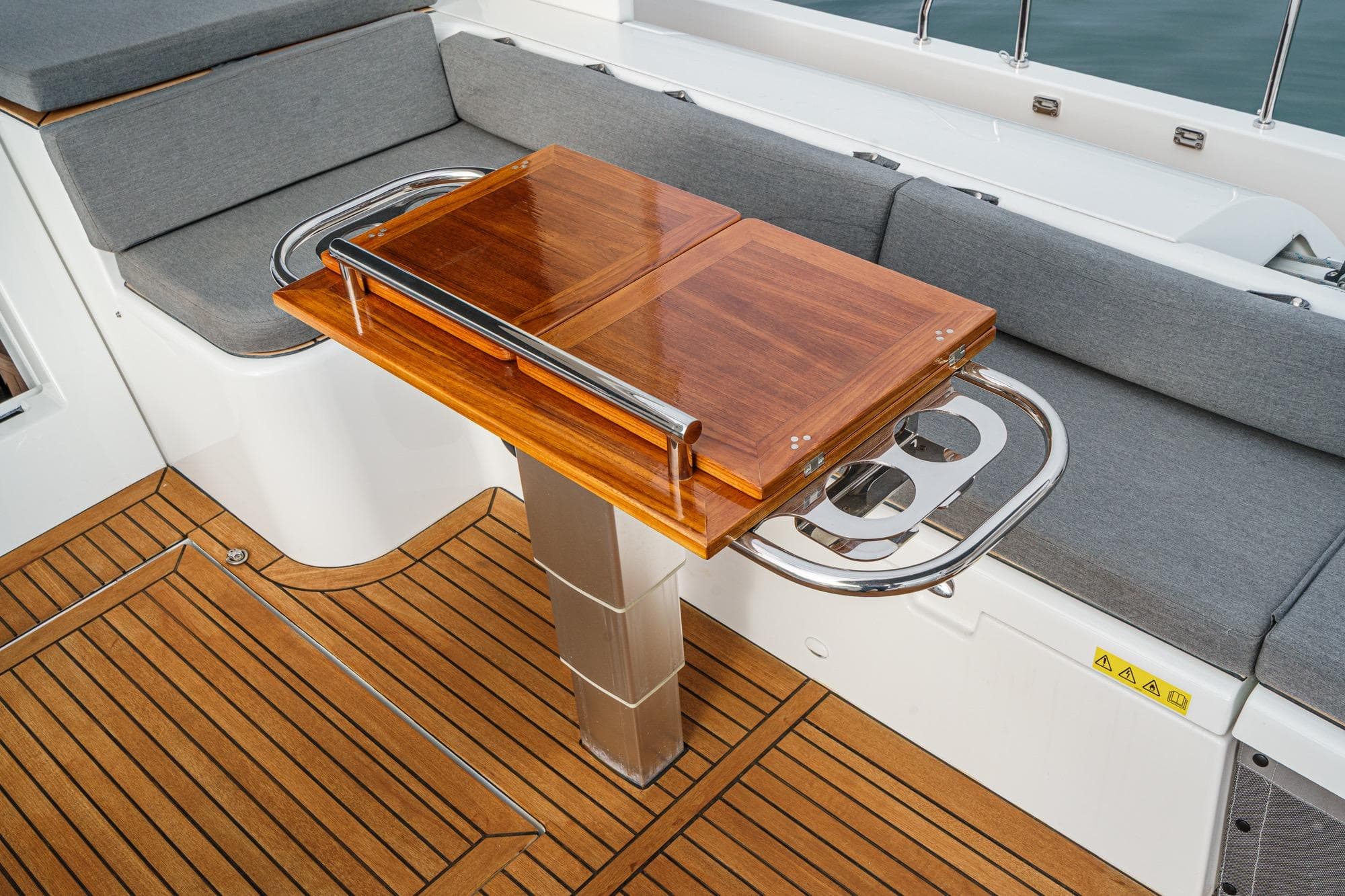 Luxurious teak deck and seating area on 2022 Beneteau Oceanis Yacht 54.
