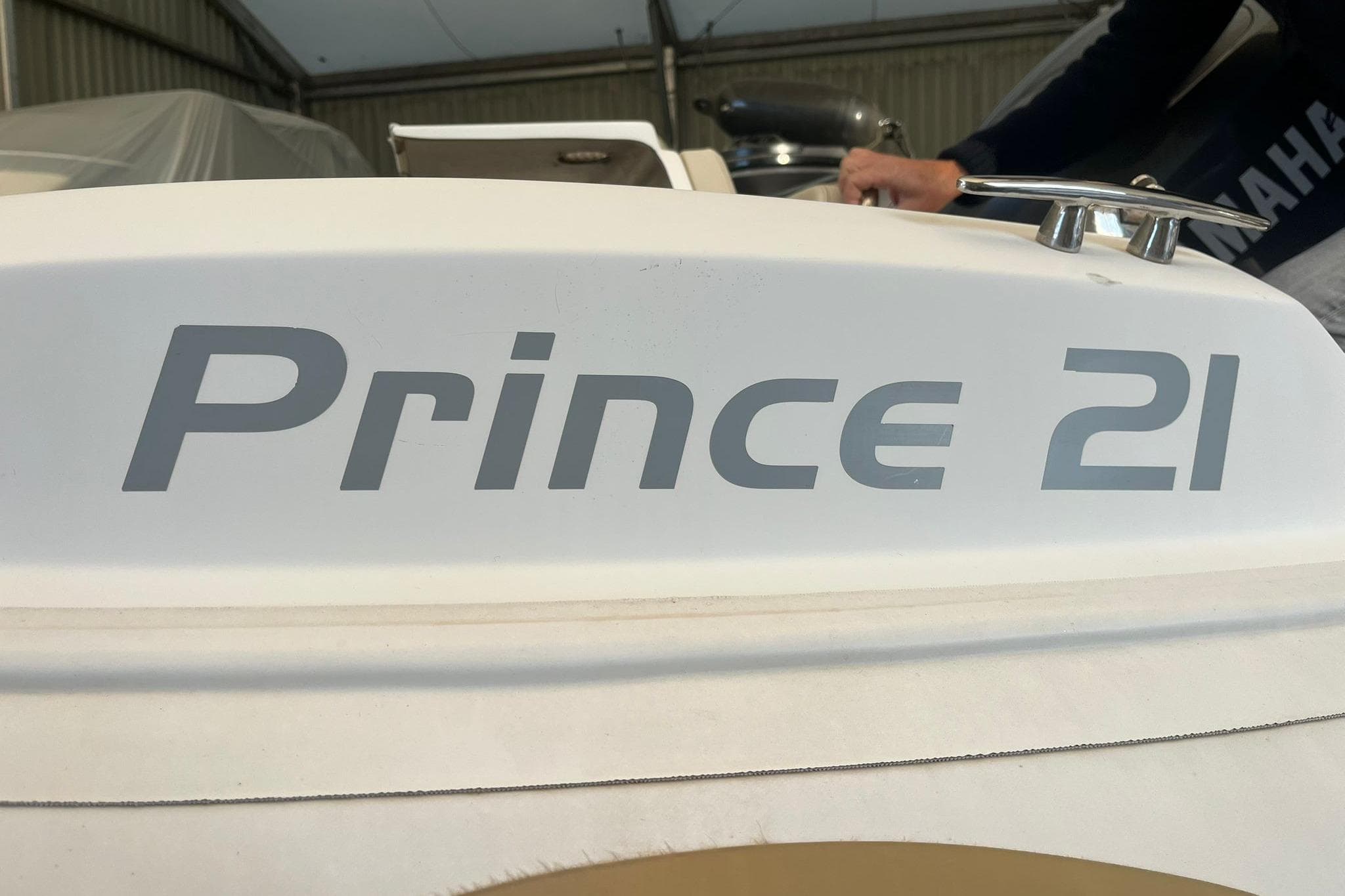Close-up of Nuova Jolly Prince 21 boat model, 2011, in a storage area.