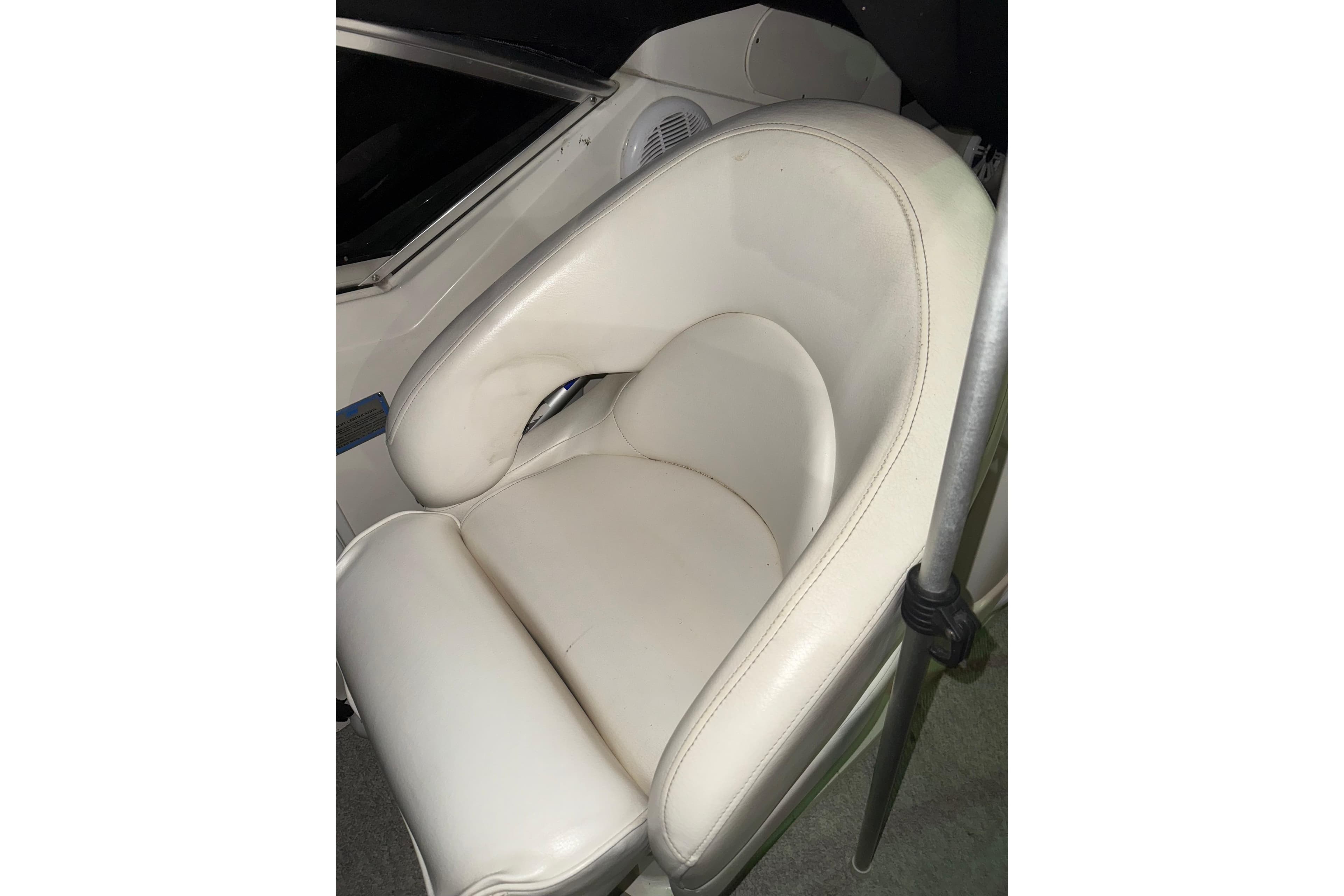 White leather seat on 2006 Sea Ray 260 Sundancer boat.