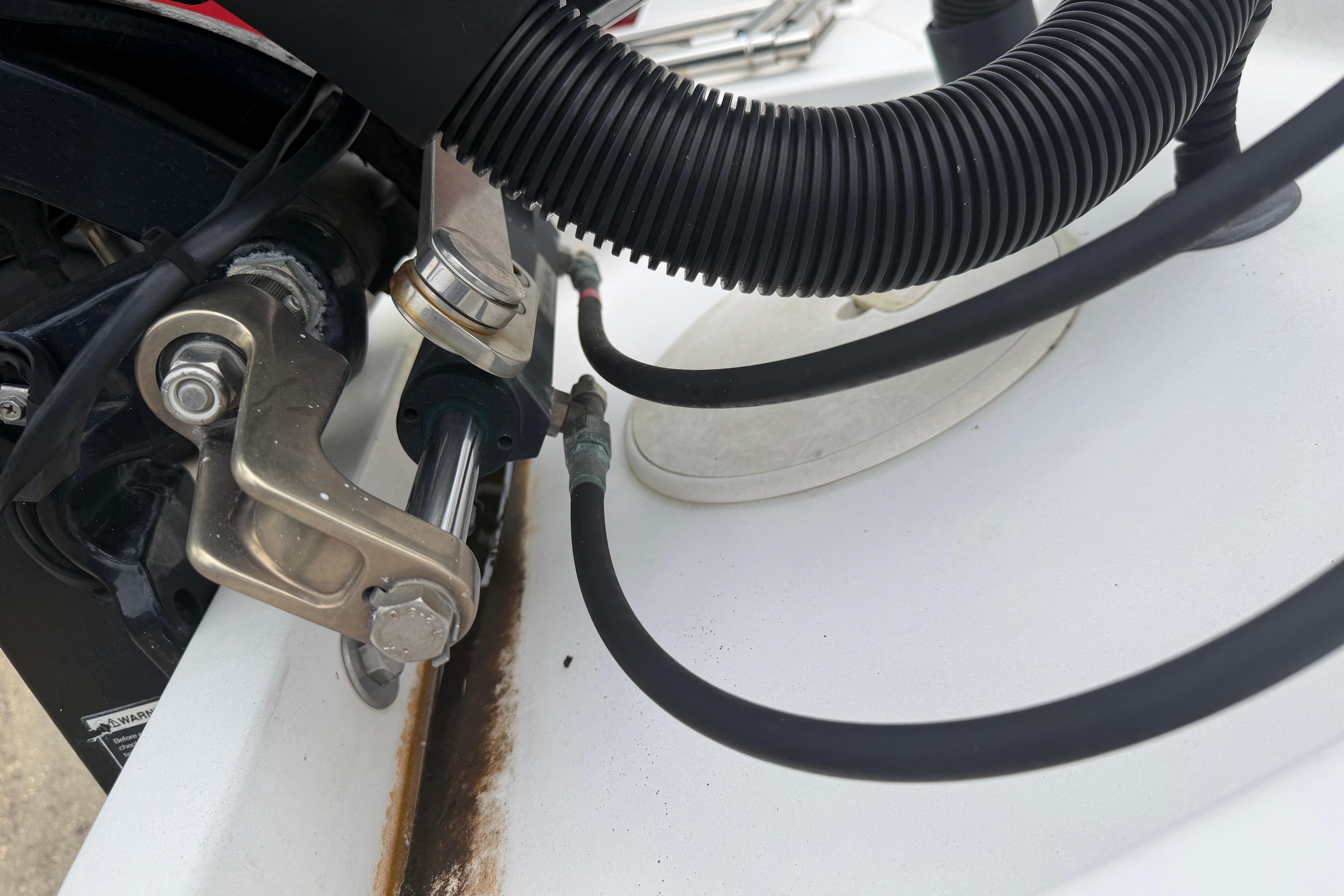 Close-up of 2016 Glasstream 192 CC boat engine components and cables.