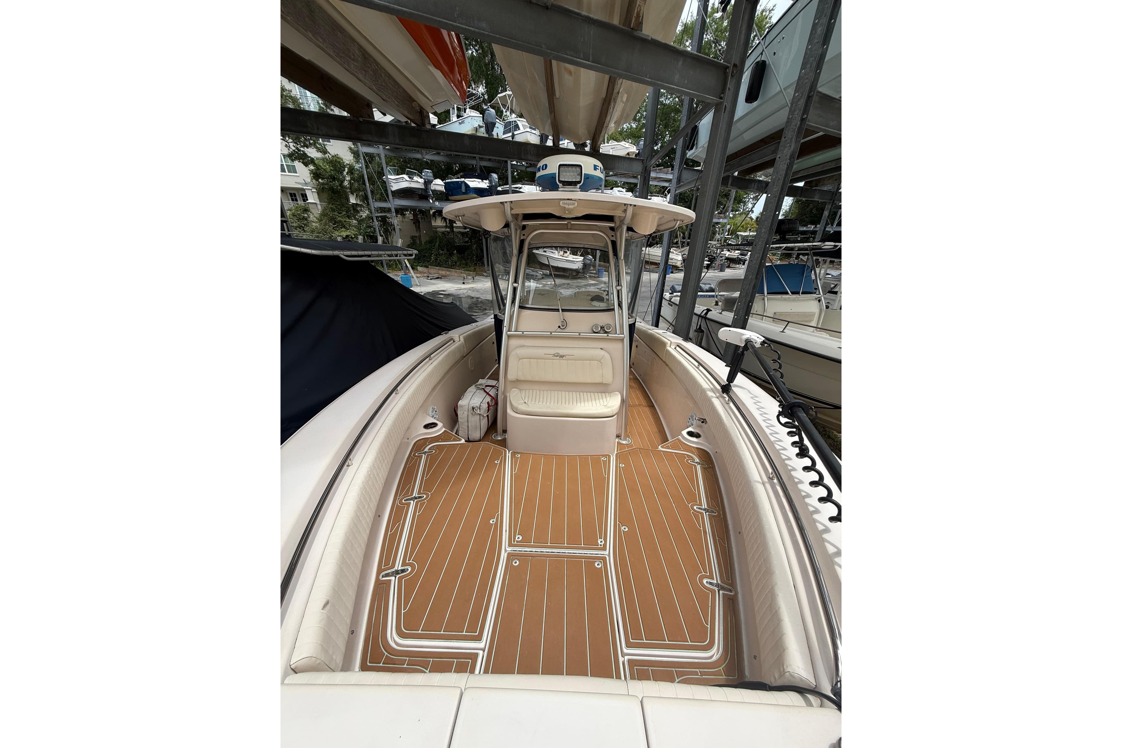 2012 Grady-White Canyon 306 boat with spacious deck and modern design.