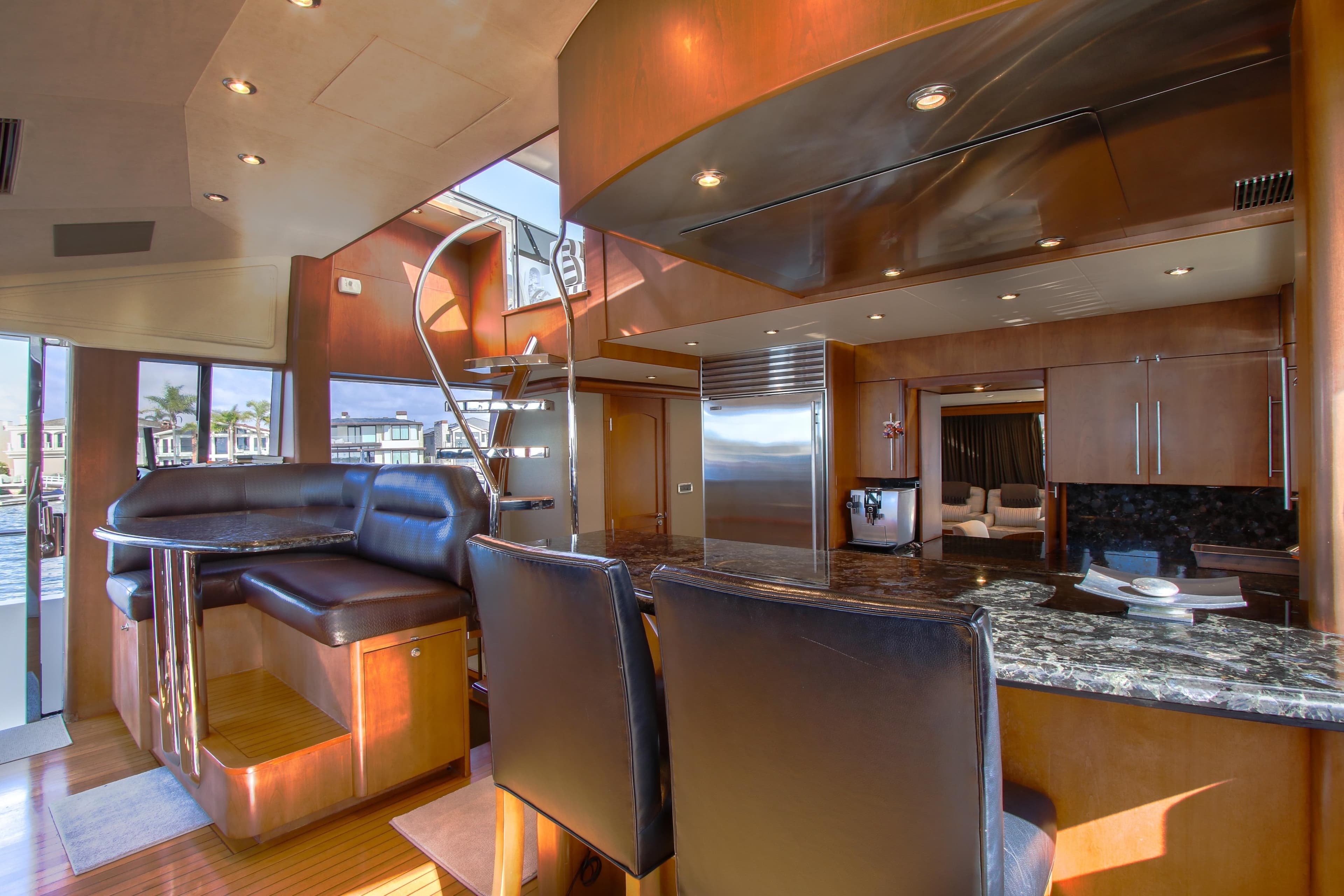 Luxurious 2006 Northcoast Yachts Yachtfisher interior with modern kitchen and seating area.