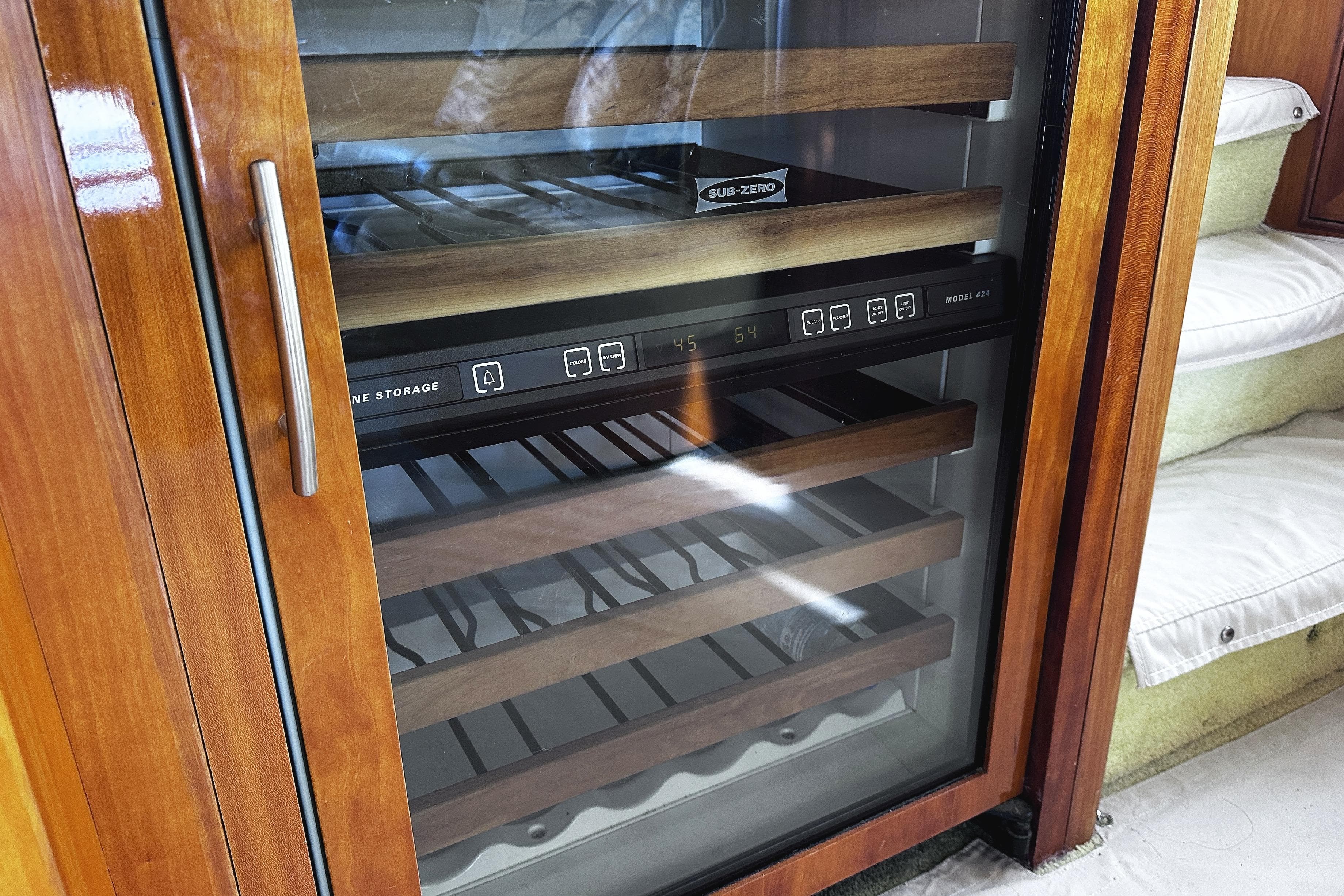 Sub-Zero wine storage in 2004 McKinna 57 PHMY yacht interior.