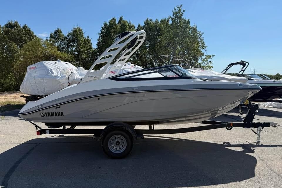 2026 Yamaha Boats 195S on trailer, sleek design, parked outdoors.