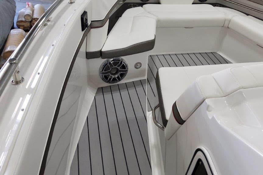2022 Formula 380 Super Sport Crossover OB interior with white seating and gray flooring.