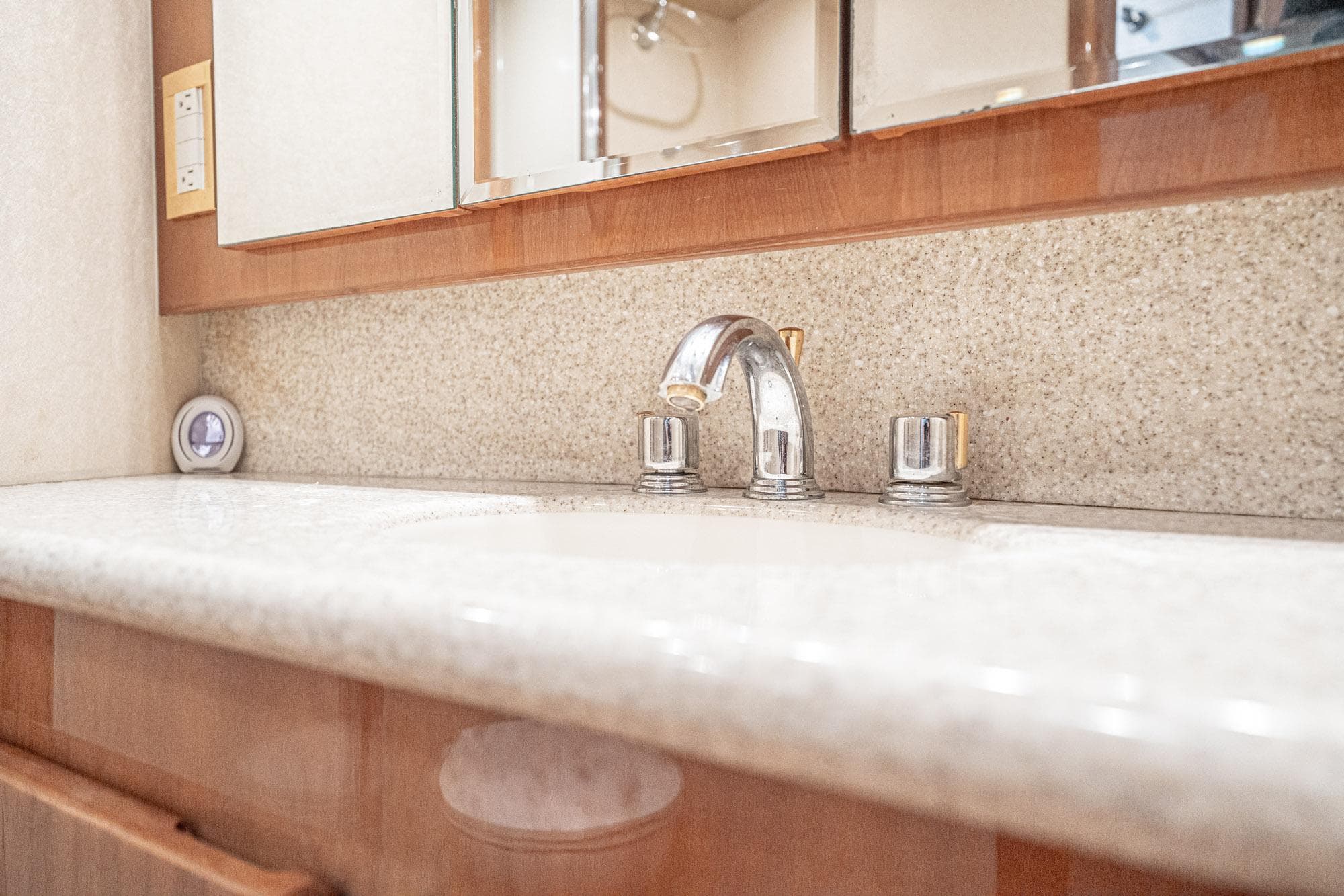 Luxurious bathroom sink in 2007 Egg Harbor 43 SportYacht with elegant fixtures.
