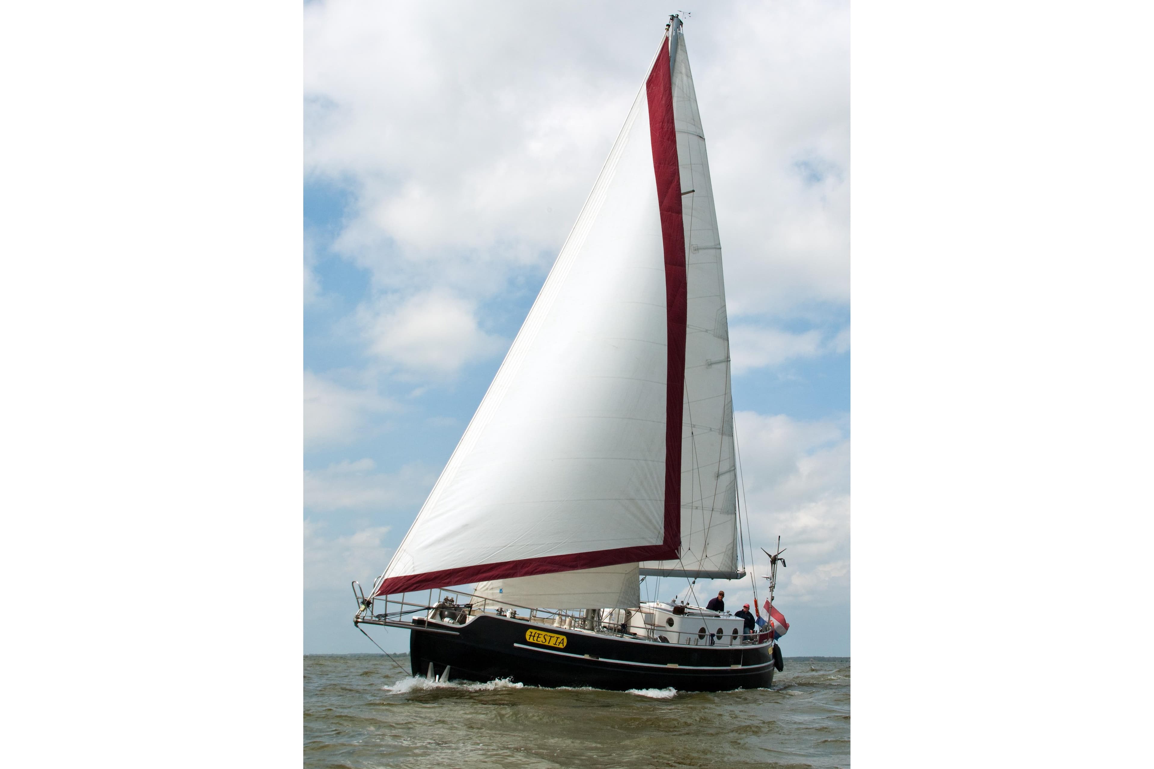 Sailing yacht Colin Archer Bronsveen 14.70, 2002 model, cruising on open water.