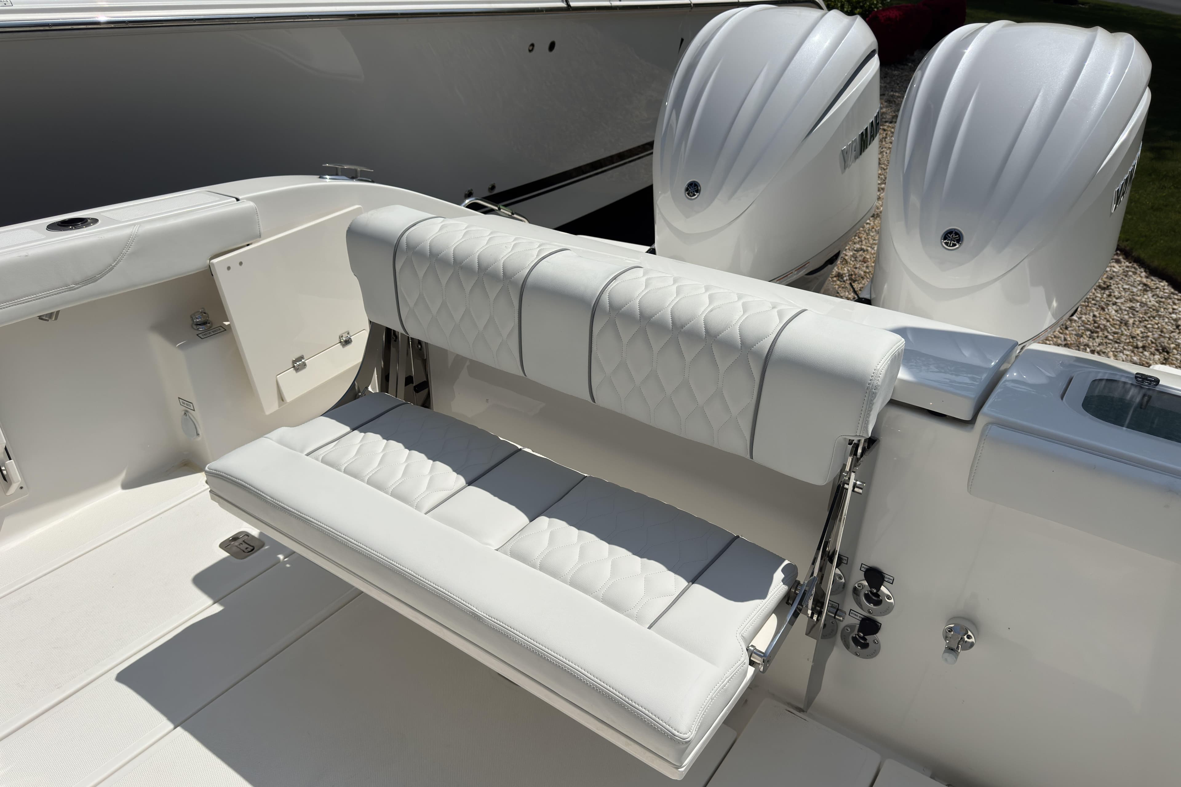 Luxury seating on 2026 Pursuit S 288 Sport boat with dual engines.