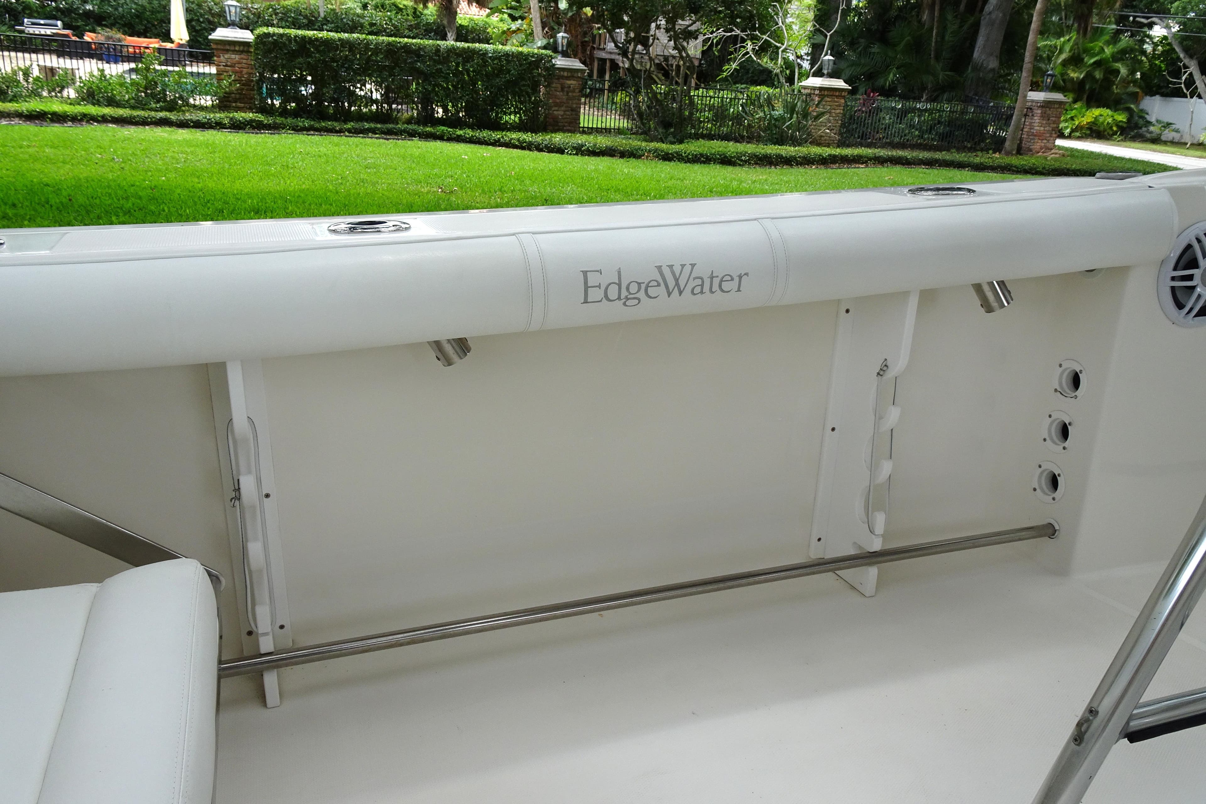 2006 Edgewater 265CC boat interior with white seating and stainless steel fittings.
