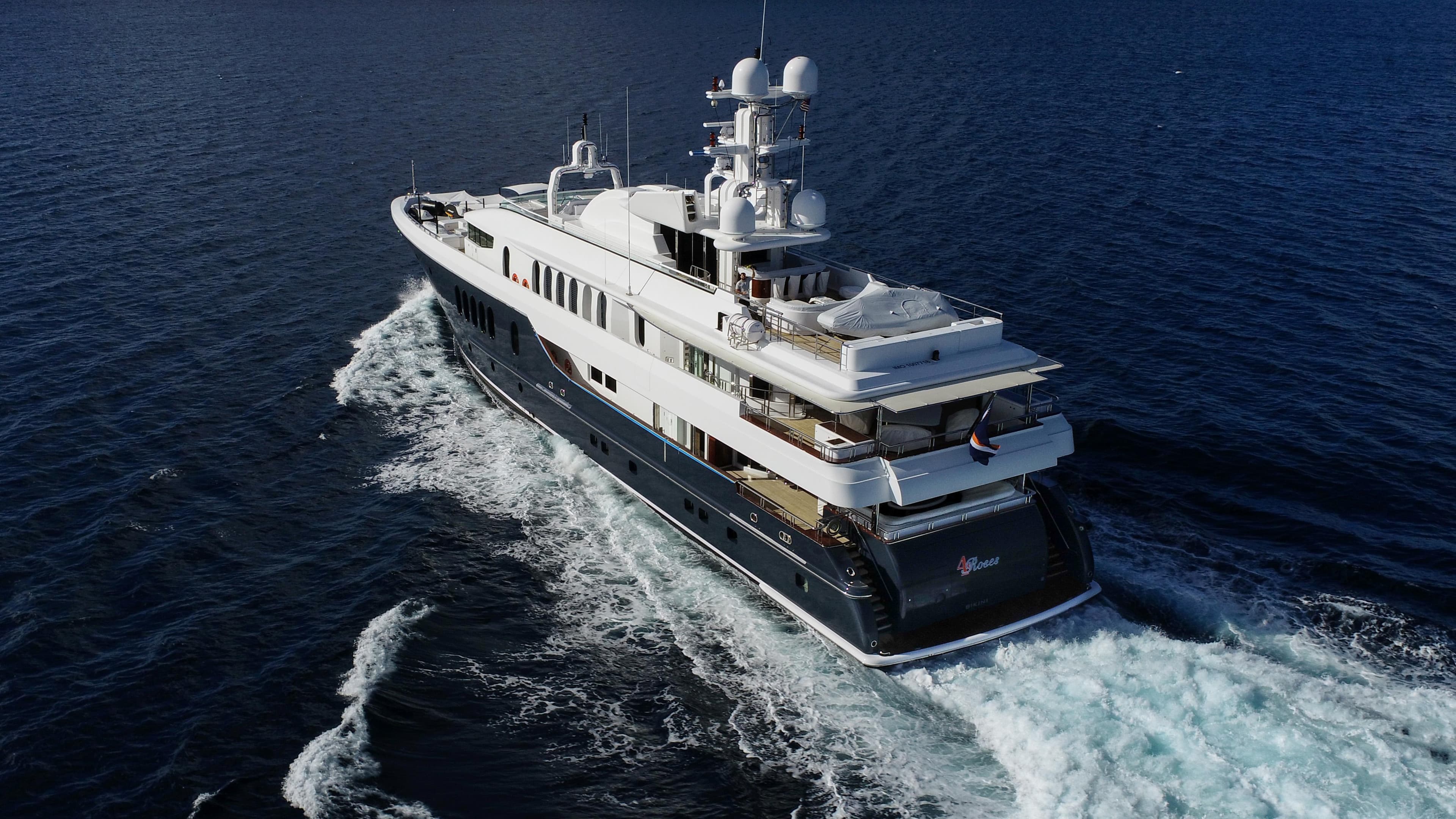 Luxurious 2004 Oceanfast Full Displacement yacht cruising on open water.