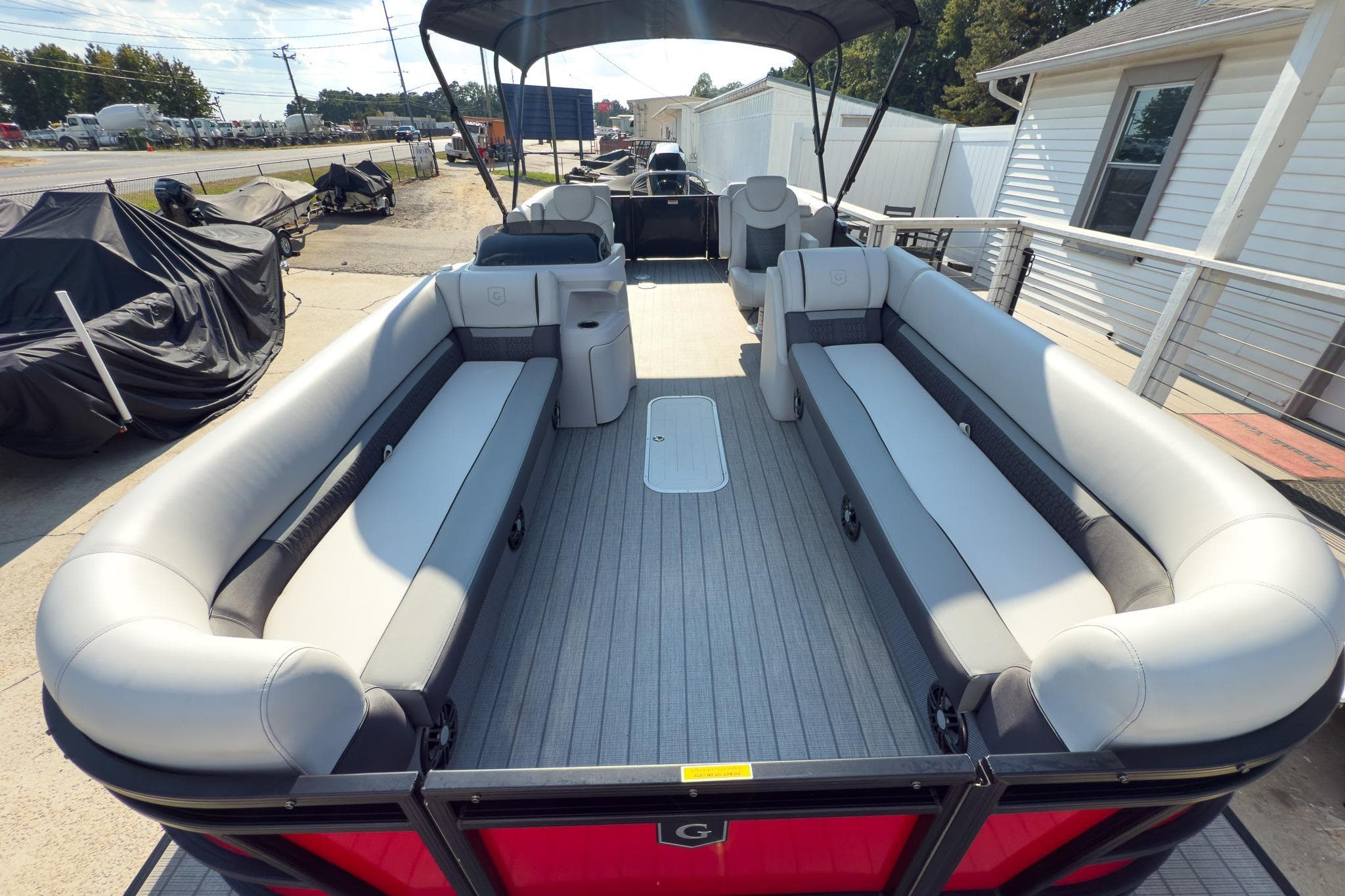2024 Godfrey Sweetwater 22' pontoon boat with spacious seating and modern design.