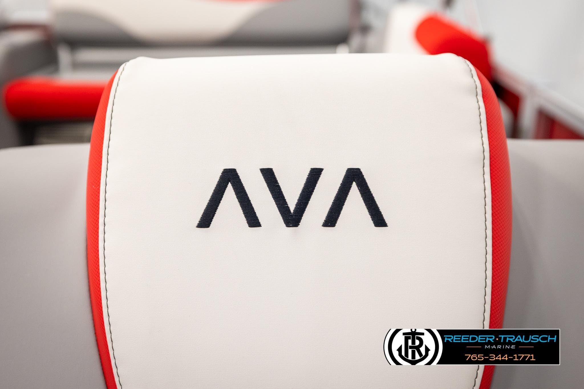 2026 Avalon LSZ Vrl boat seat with red accents and logo detail.
