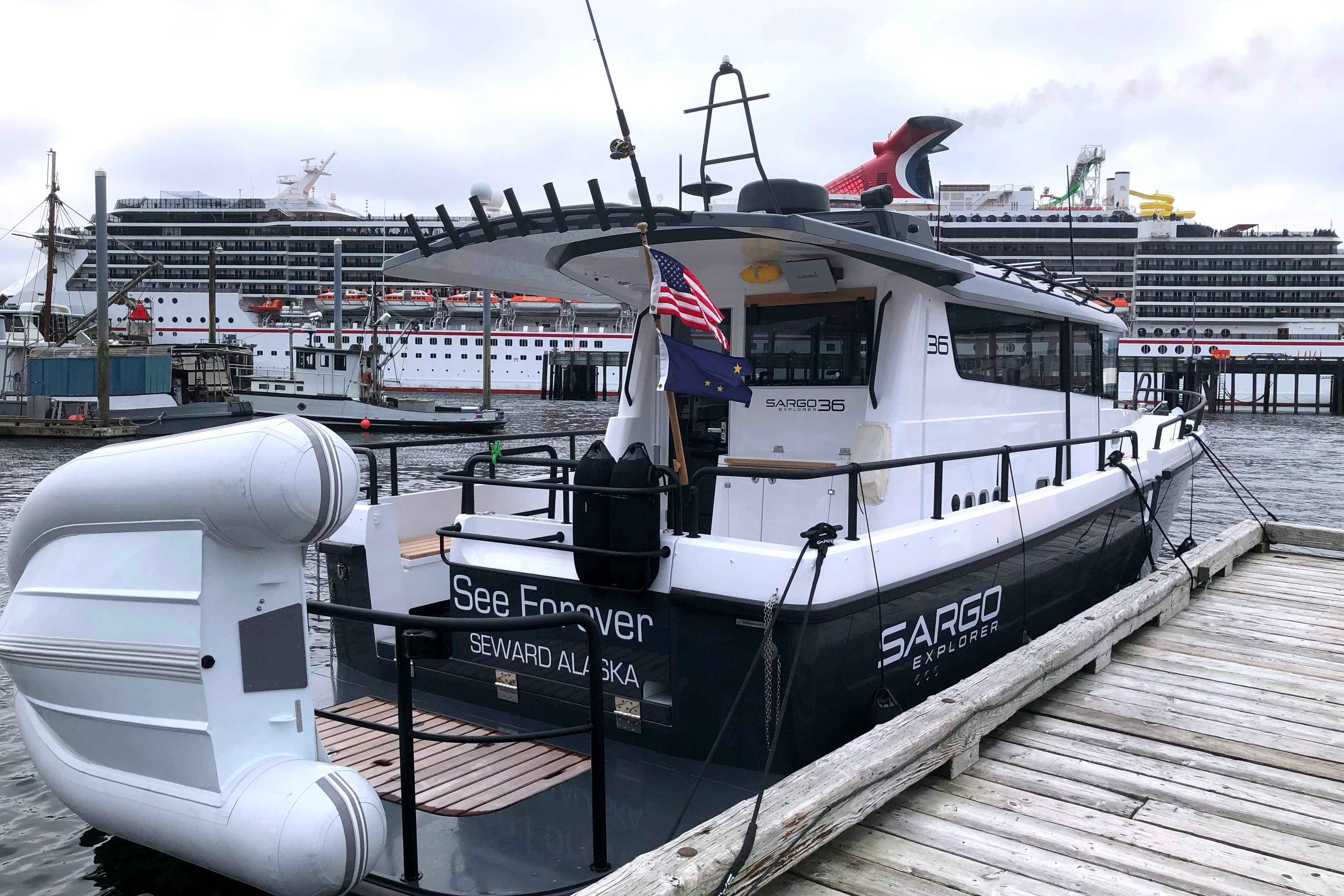 2019 Sargo 36 Explorer docked in Seward, Alaska, with cruise ships in the background.