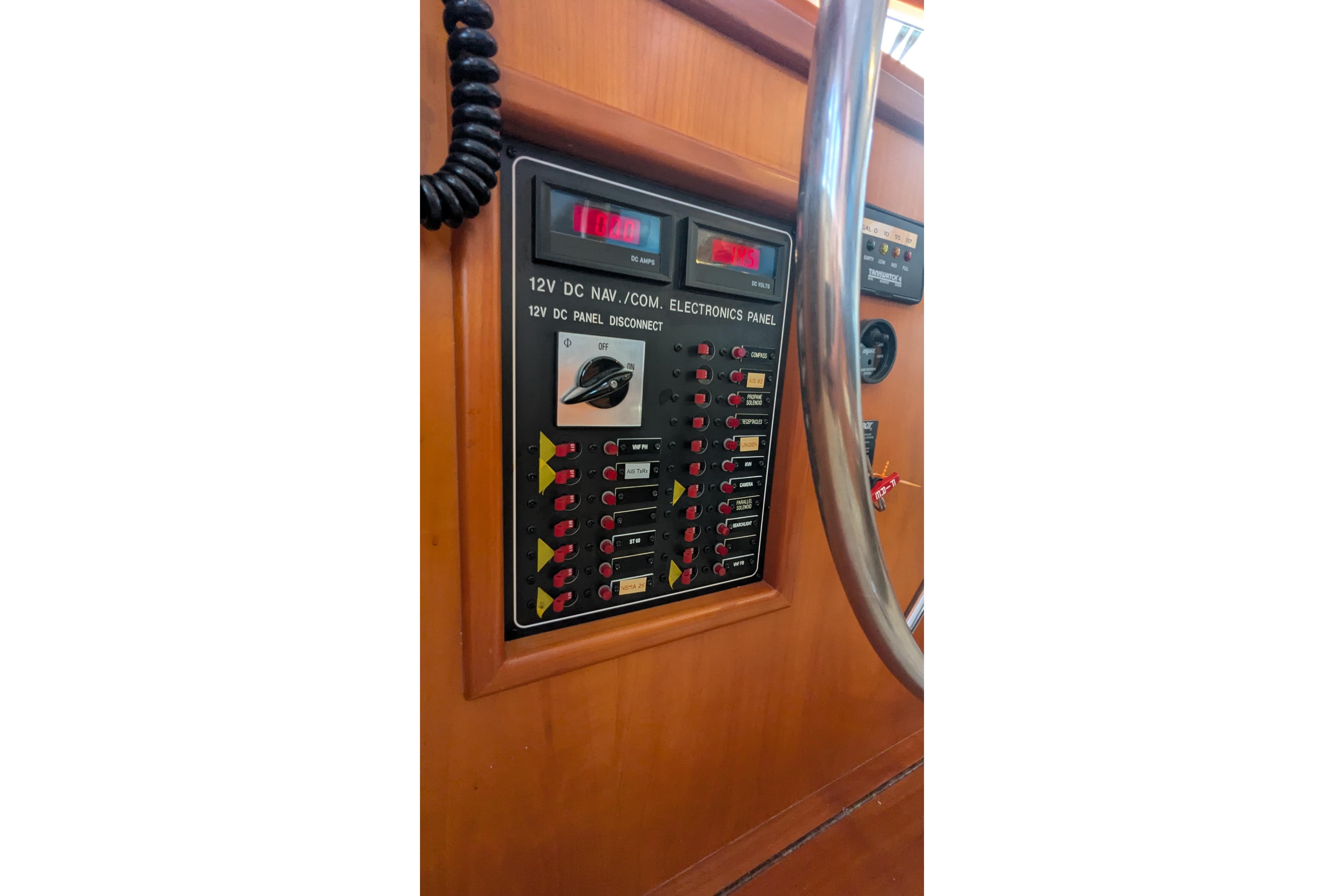 2005 Kadey-Krogen Pilothouse electronics panel with 12V DC navigation controls.
