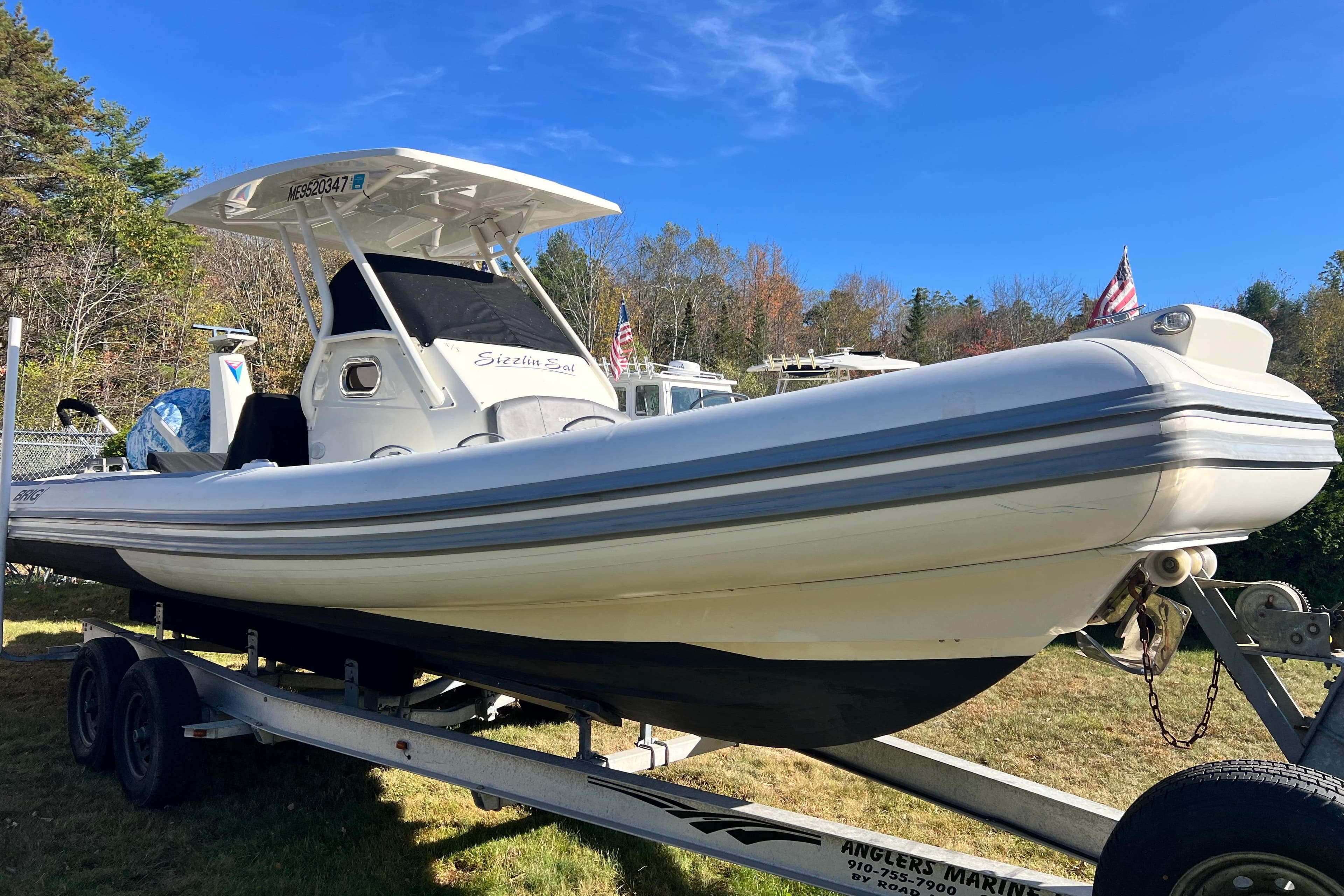 2022 Brig Eagle 8 boat on trailer, displayed outdoors under clear blue sky.