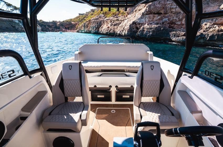 Interior of 2025 Navan S30 boat with luxurious seating and scenic ocean view.
