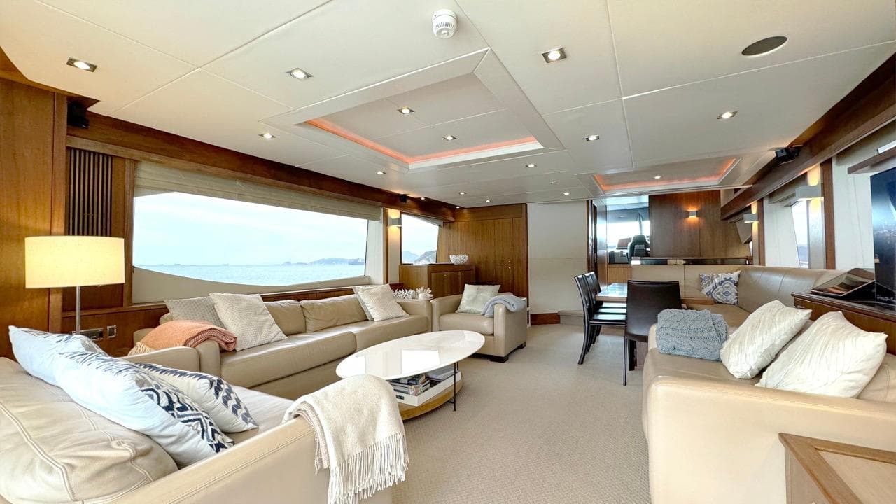 Luxurious interior of 2009 Sunseeker 86 Yacht with elegant seating and dining area.