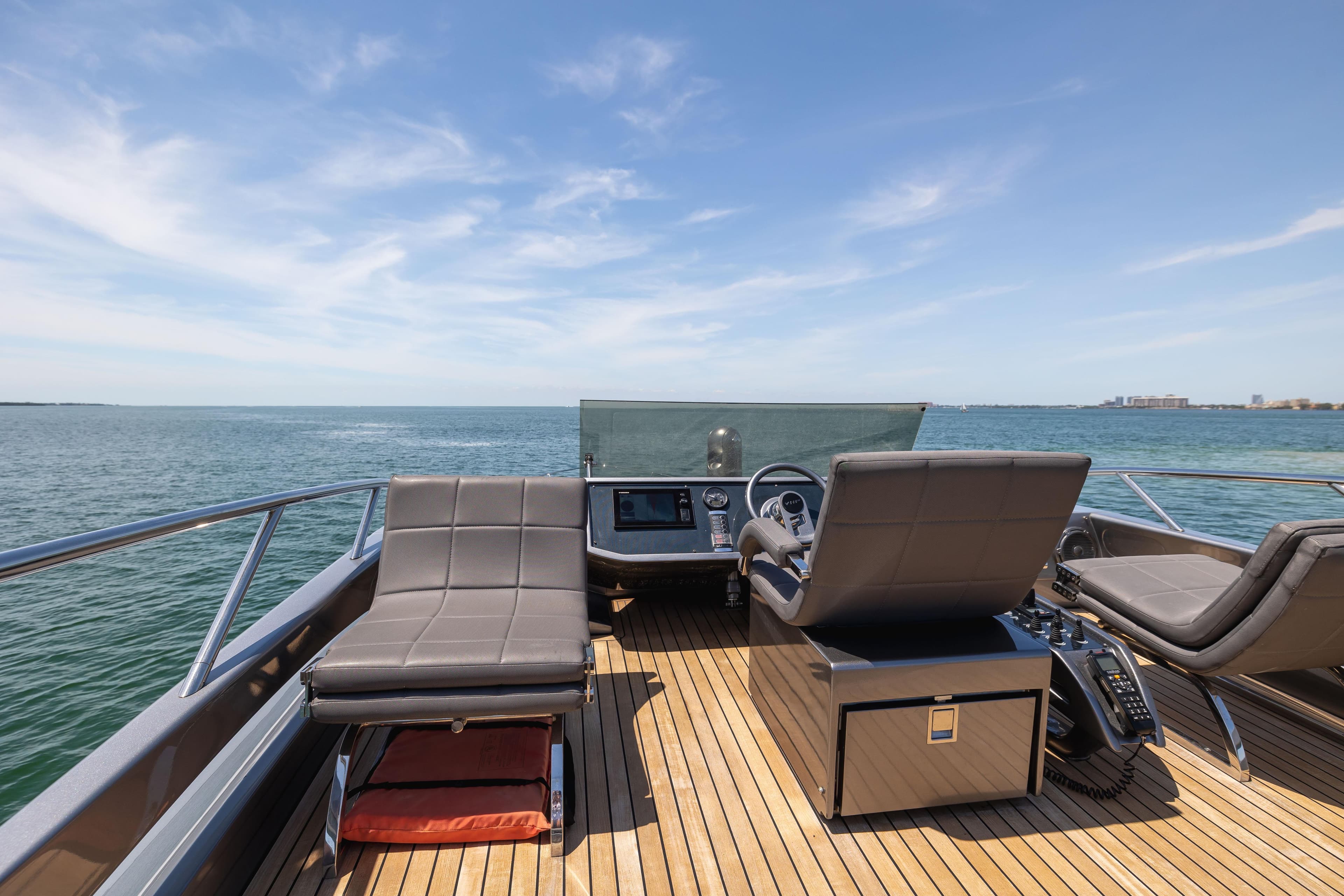 2017 Pershing 82 VHP yacht deck with luxurious seating and ocean view.