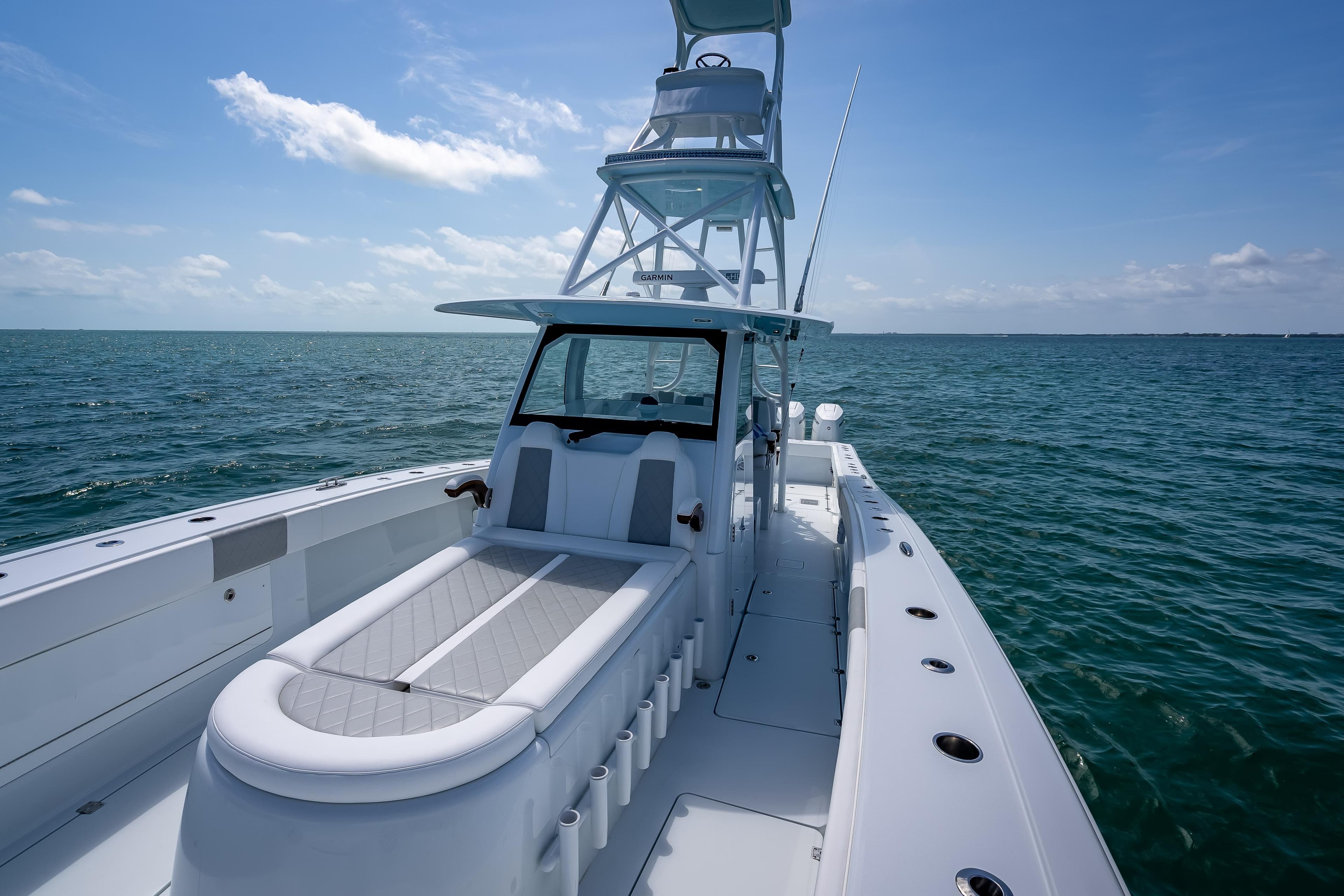2025 Freeman 43 boat on open sea, featuring sleek design and spacious deck.