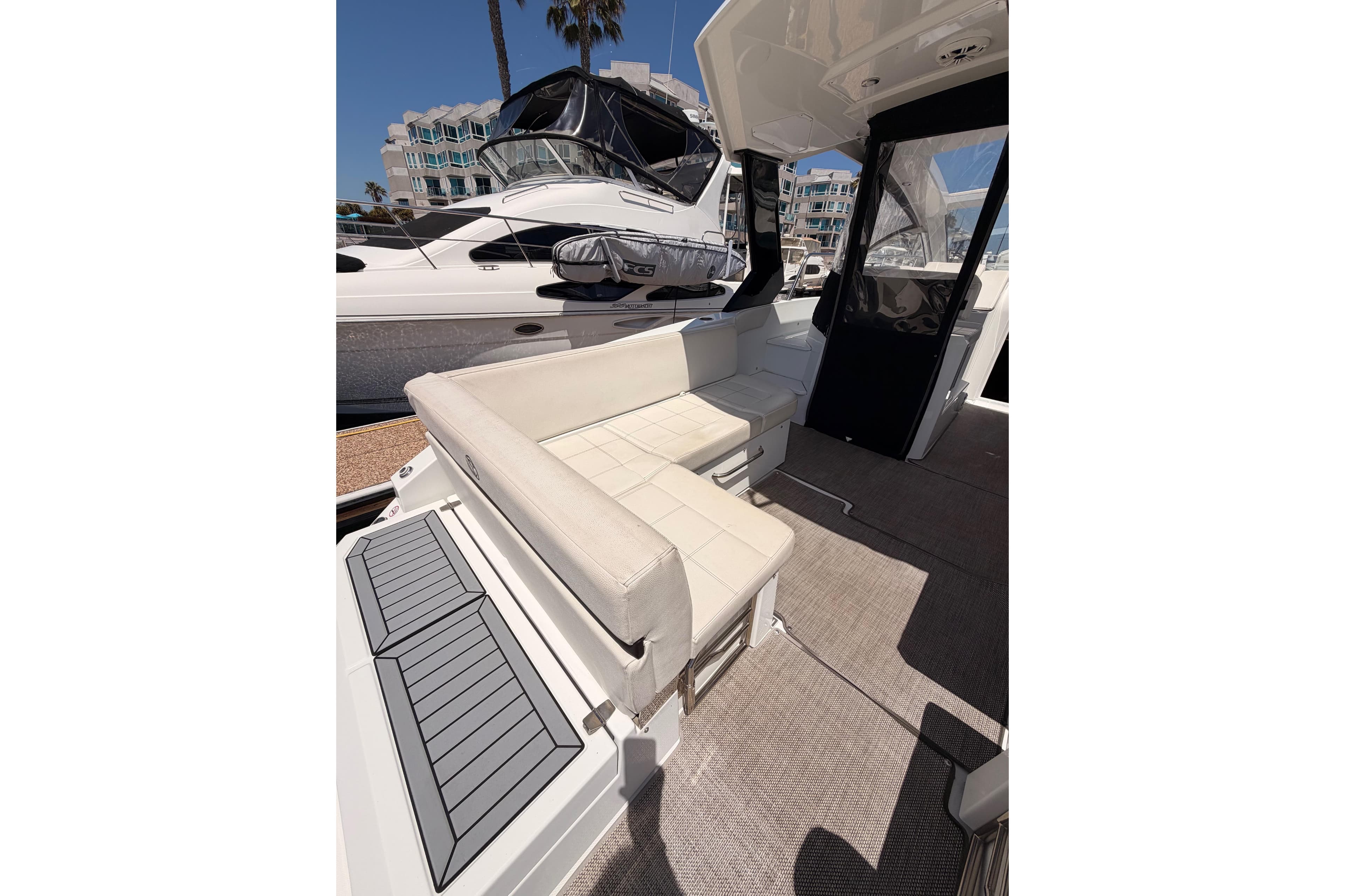 2020 Cruisers Yachts 390 Express Coupe interior with seating and modern design.